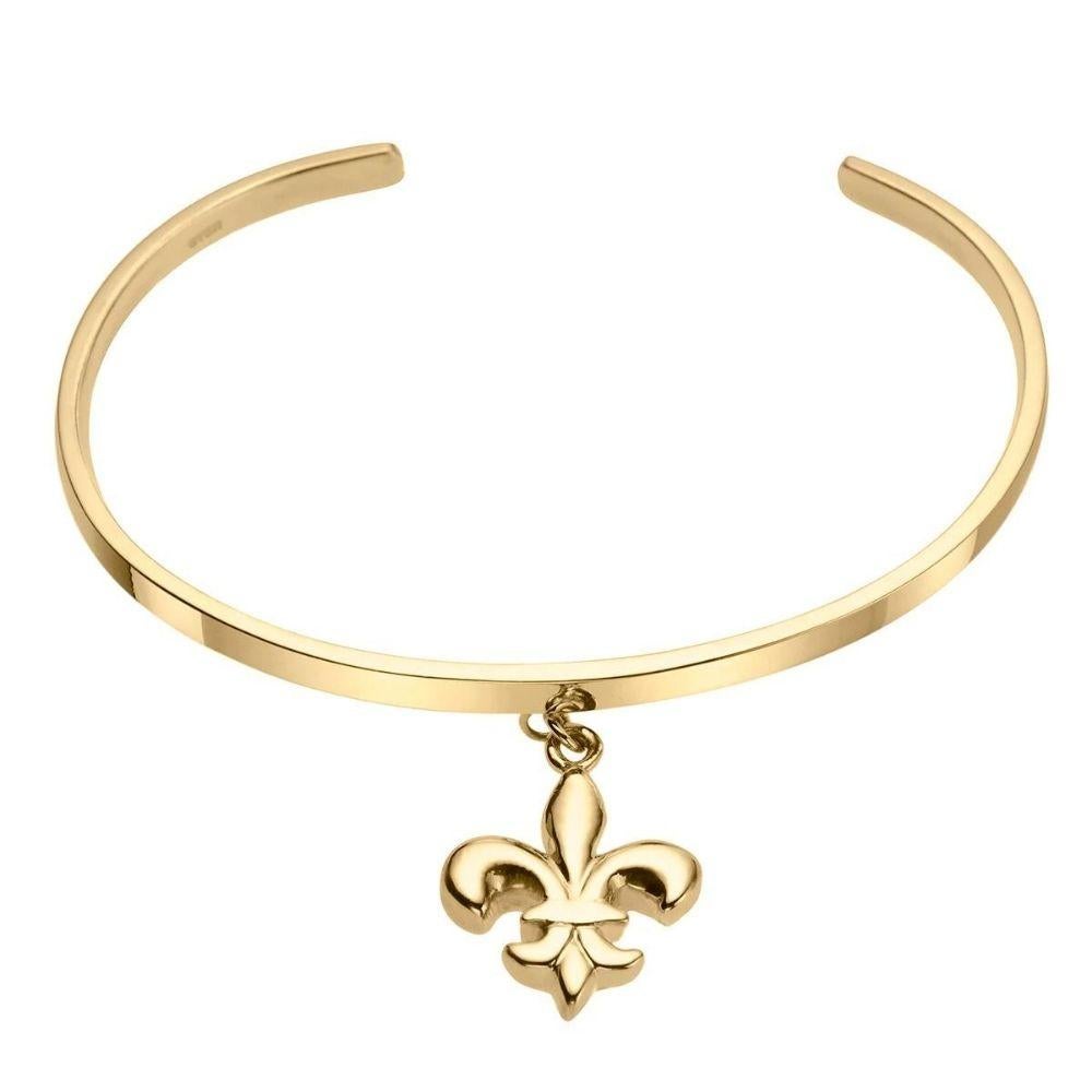 Fleur-de-lis cuff crafted in recycled 14k rose gold from our 
