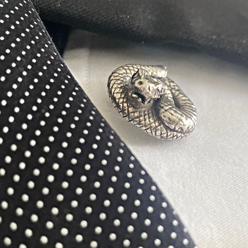 These snakes are real rattlers… any snake charmer would agree!  Exquisitely detailed Rattle Snake Cufflinks in Recycled Sterling Silver with 5pt round brilliant cut Black Diamond Eyes. Also available in 14K Yellow Gold. Snake measures  1