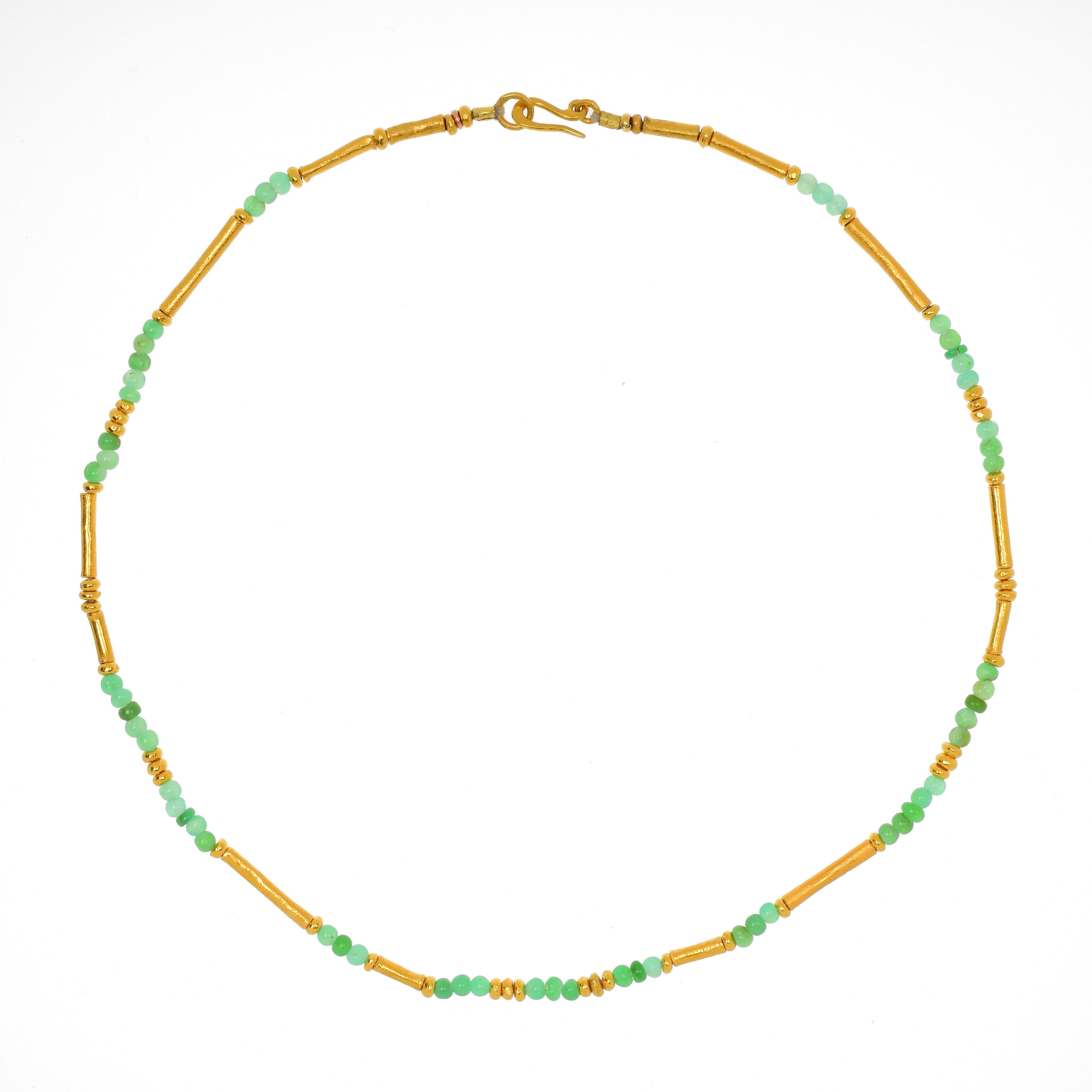 There is an ancient feel to this chrysophrase and gold vermeil necklace. With each metal bead having been hand crafted, it has a soft, organic feel around the neck. The s-clasp is easy to use and secure. 

Please don't hesitate to contact us if you