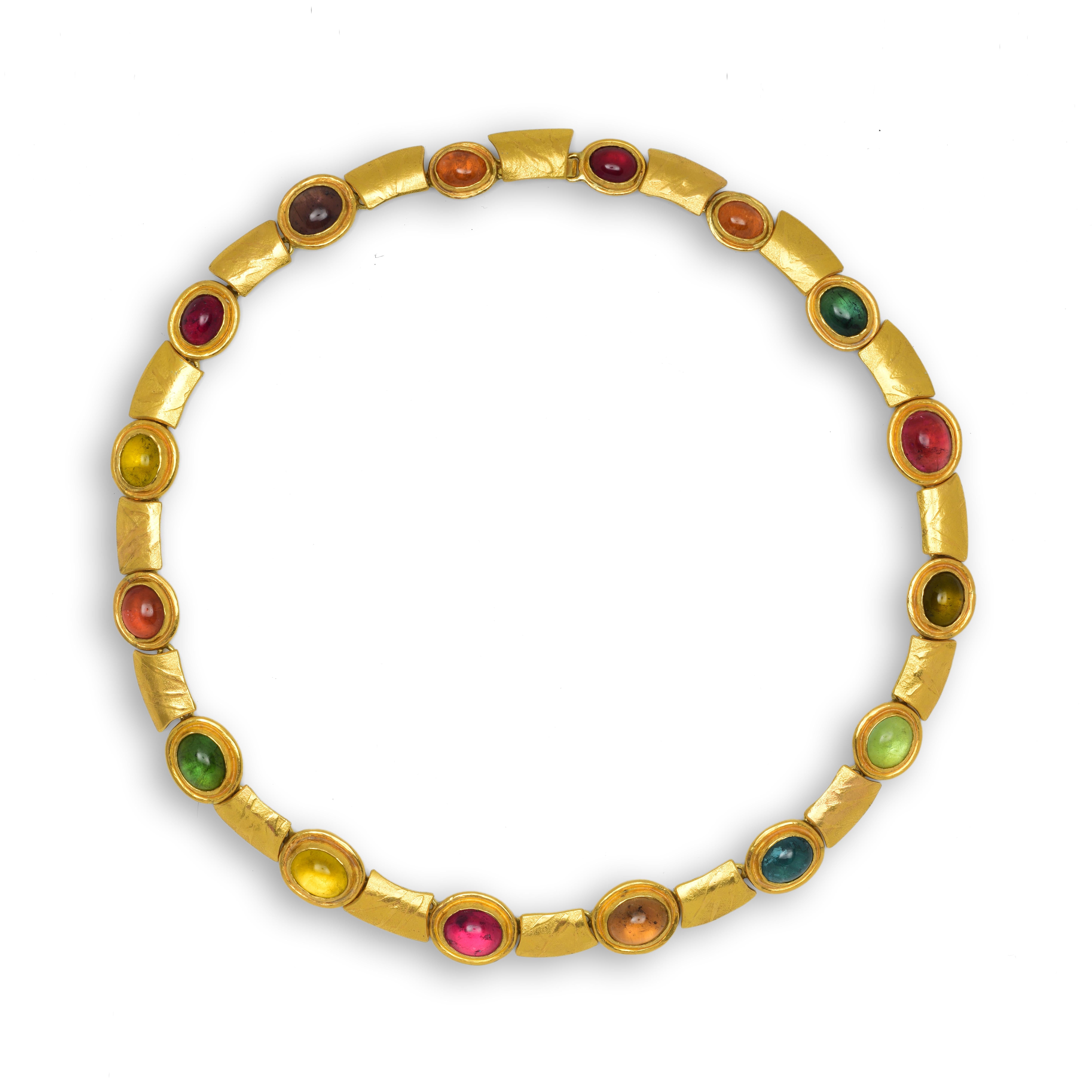 An organic yet striking necklace which is constructed of solid yellow gold and multicoloured tourmalines. It easily flows around the neck with a staggering total of 66 grams of 22 karat and 18 karat gold. The tourmaline stones are bright and clear,