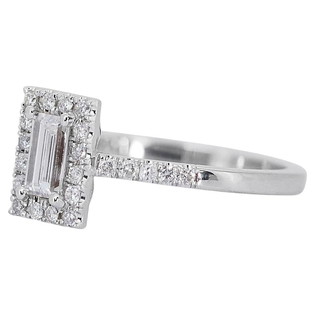Charming 1.26ct Emerald-Cut Diamond Halo Ring in 18k White Gold - GIA Certified

This sophisticated diamond halo ring, crafted from premium 18k white gold, features an alluring 1.04-carat emerald-cut main diamond. Surrounding the central diamond are