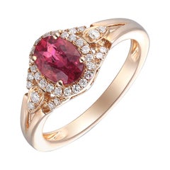 Charming 14 Karat Pink Gold Diamond, and Ruby Ring