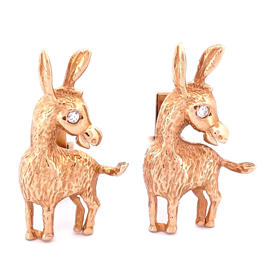 Add a playful touch to your attire with our charming 14k yellow gold donkey cufflinks. These delightful accessories feature intricately crafted donkey designs, with sparkling diamonds serving as the eyes. 

Selling Price: $1100.00

Elevate your