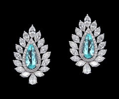 Charming 18 Karat White Gold, Diamond and Paraiba Earring