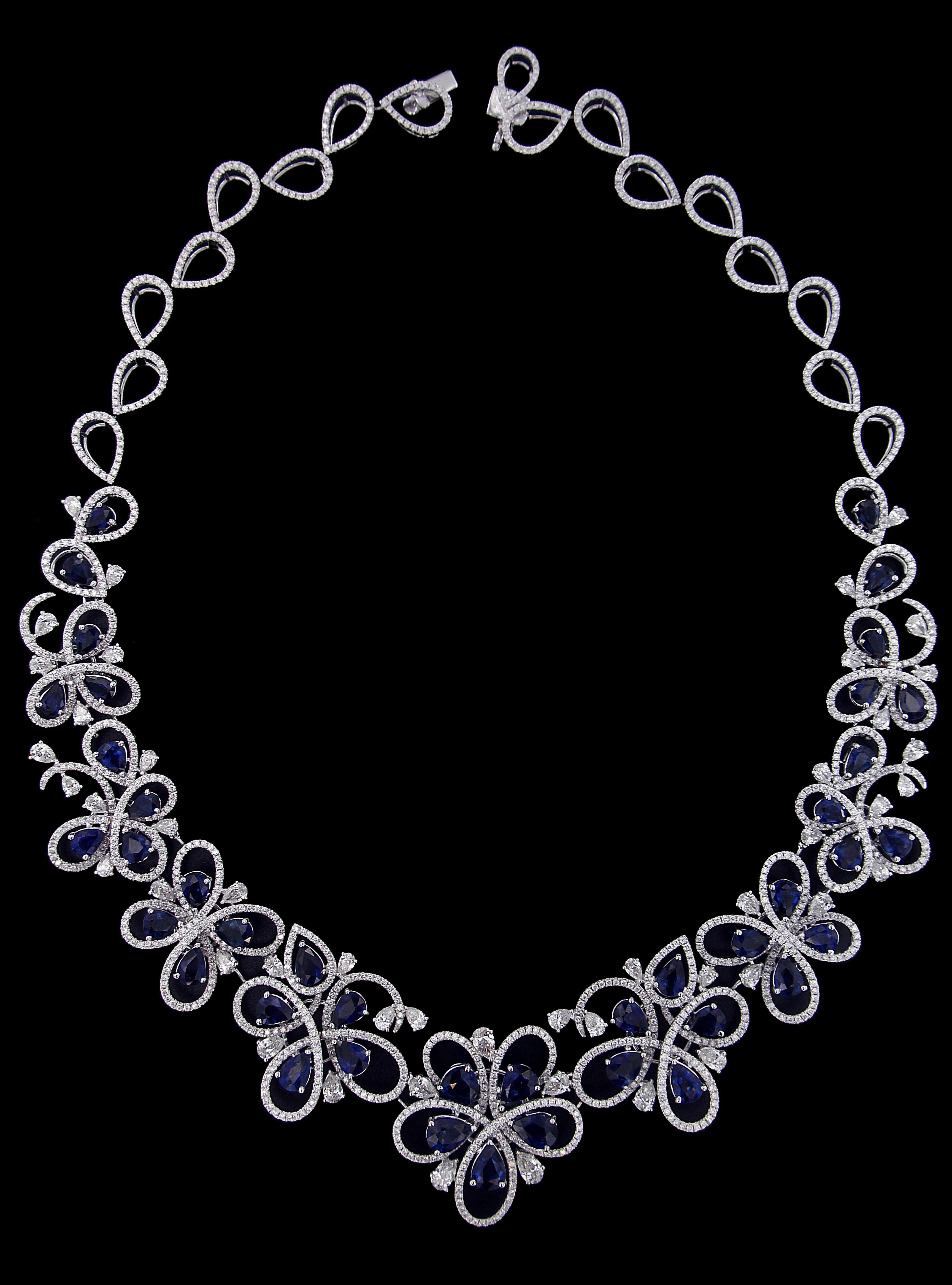 Charming 18 Karat White Gold, Diamond and Sapphire Set
Necklace:	
Diamonds of approximately 15.904 carats and sapphires approximately of 30.192 carats, mounted on 18 karat white gold necklace. The Necklace weighs approximately around 75.271