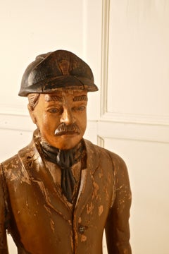 Charming 1920s Wooden Fireman Sculpture