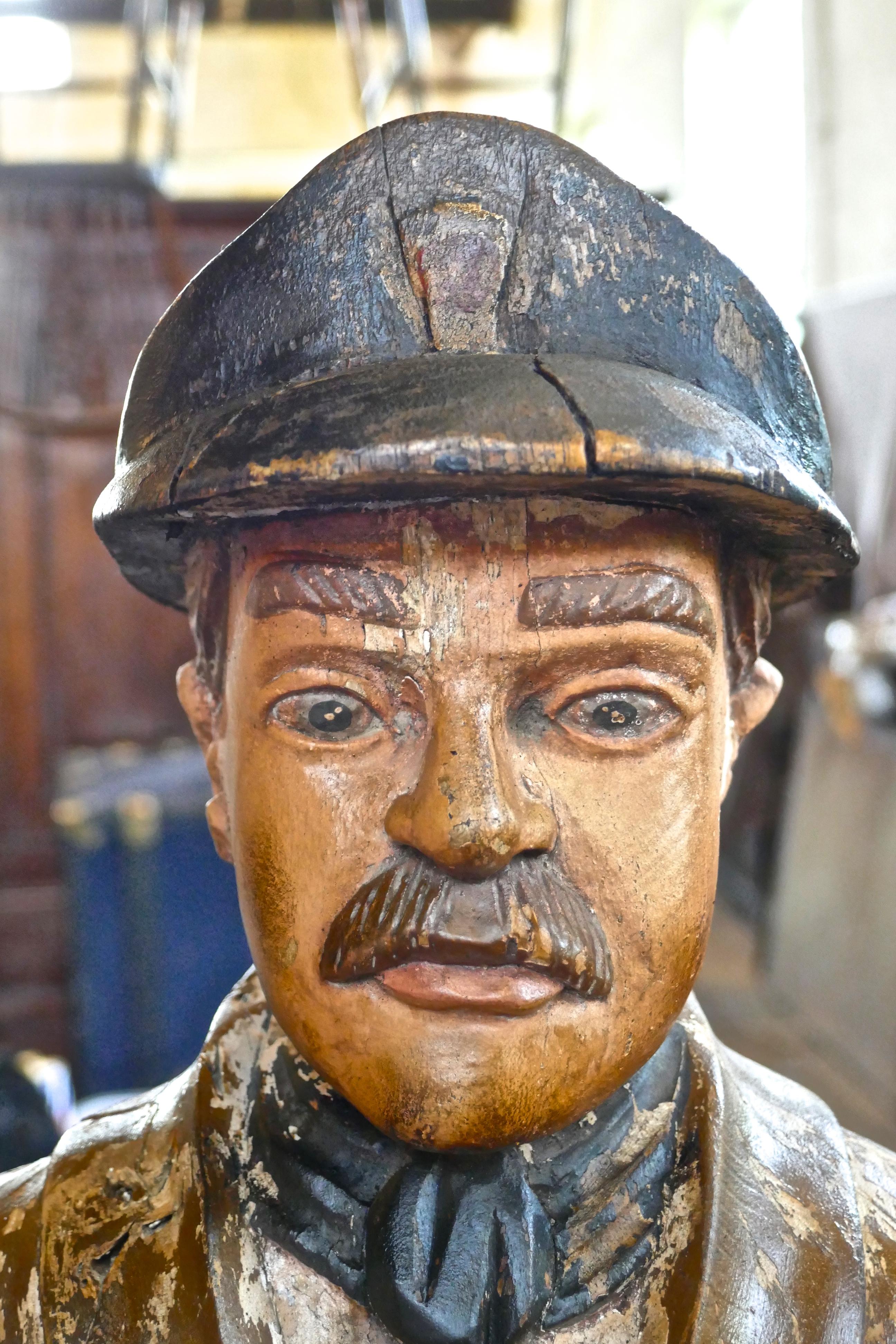 Charming 1920s Wooden Fireman Sculpture For Sale 1