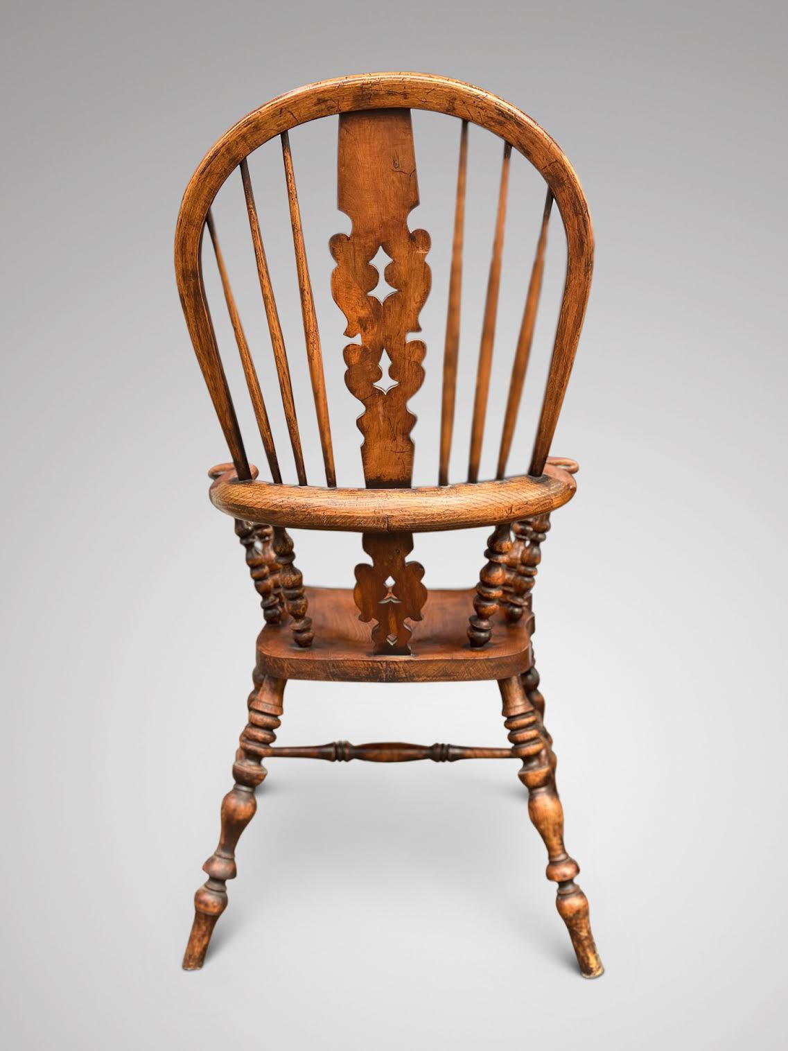 British Charming 19th Century Elm Broad Arm Windsor Chair For Sale