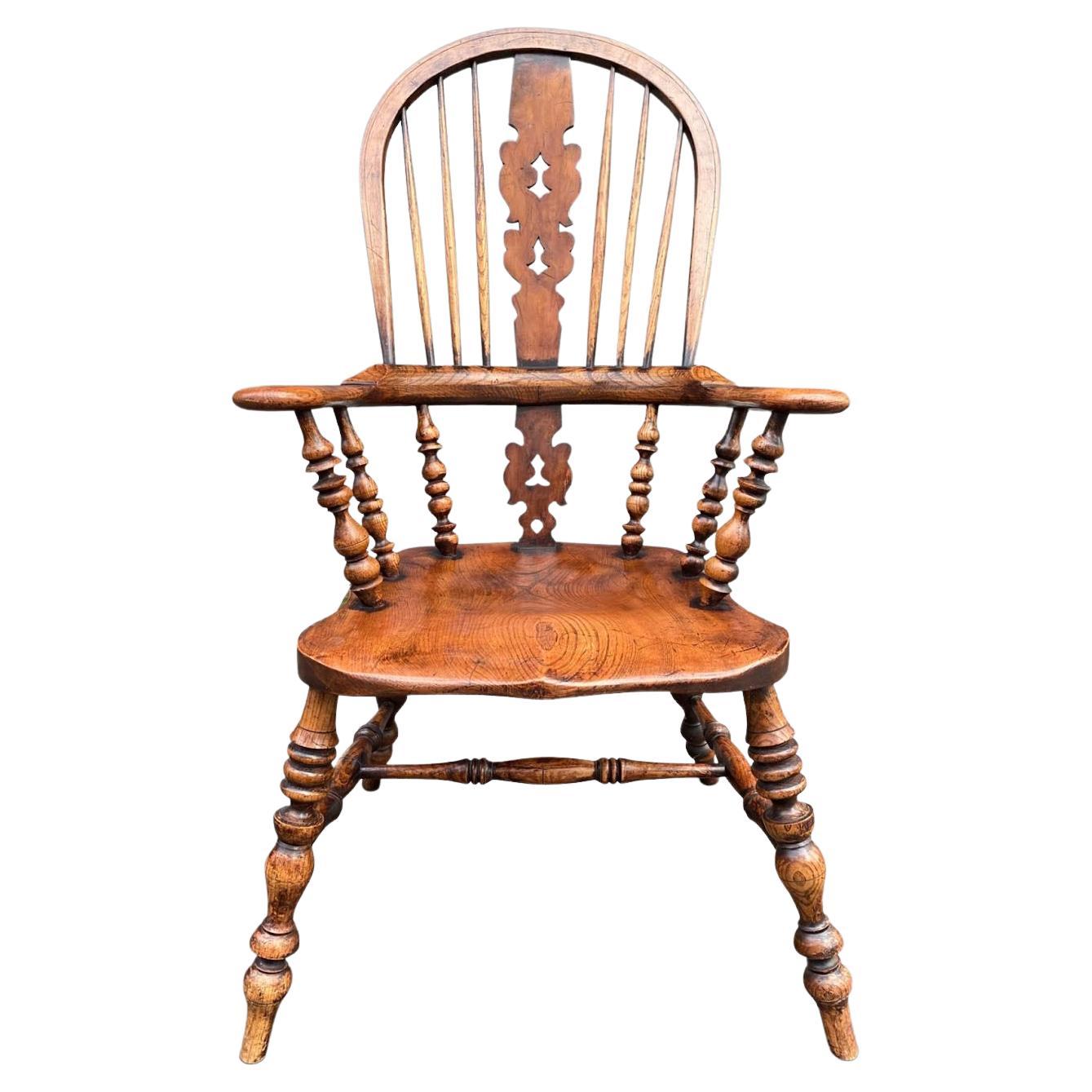 Charming 19th Century Elm Broad Arm Windsor Chair For Sale