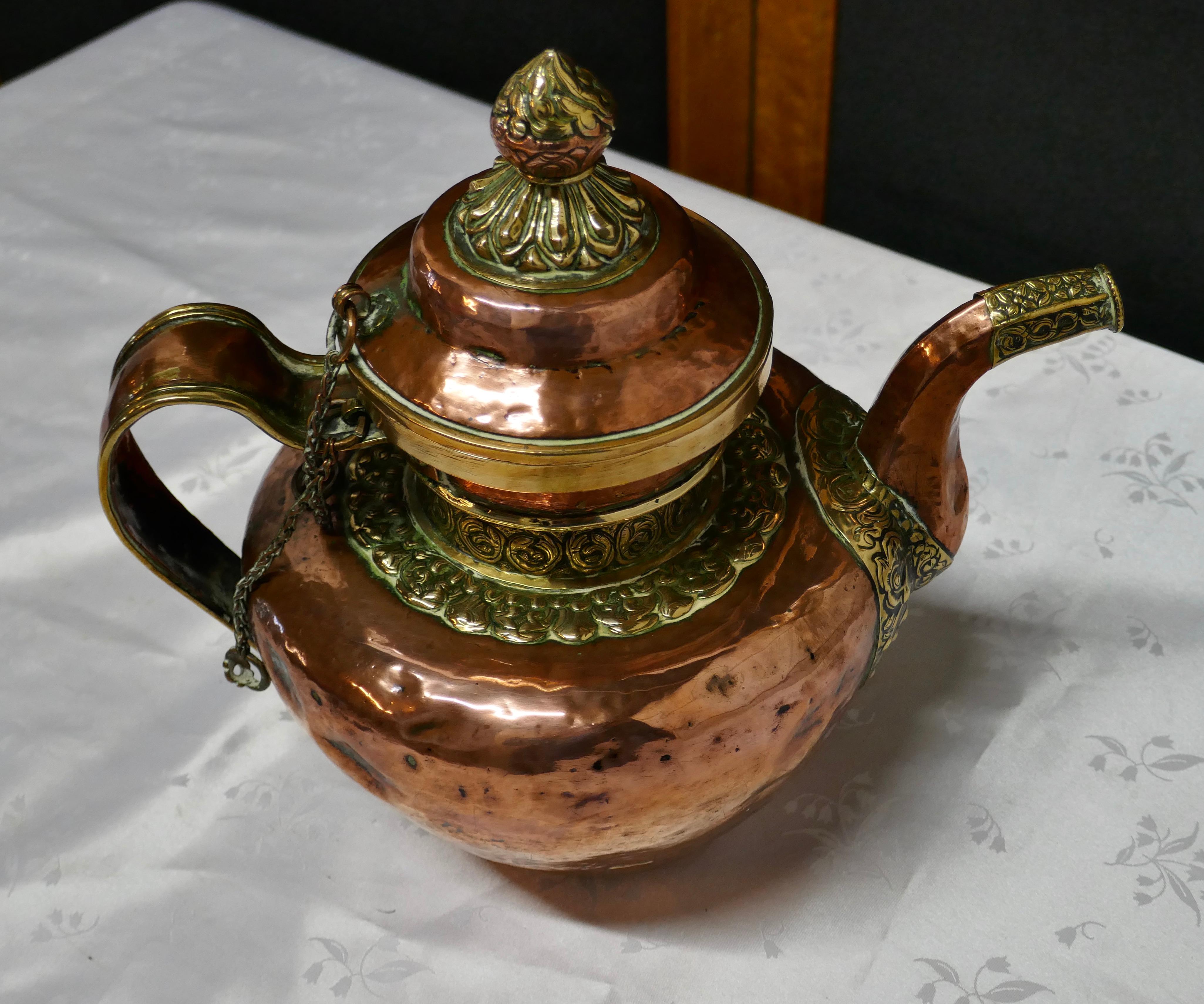 Anglo-Indian Charming 19th Century Indian Beaten Copper and Chased Brass Tea Pot