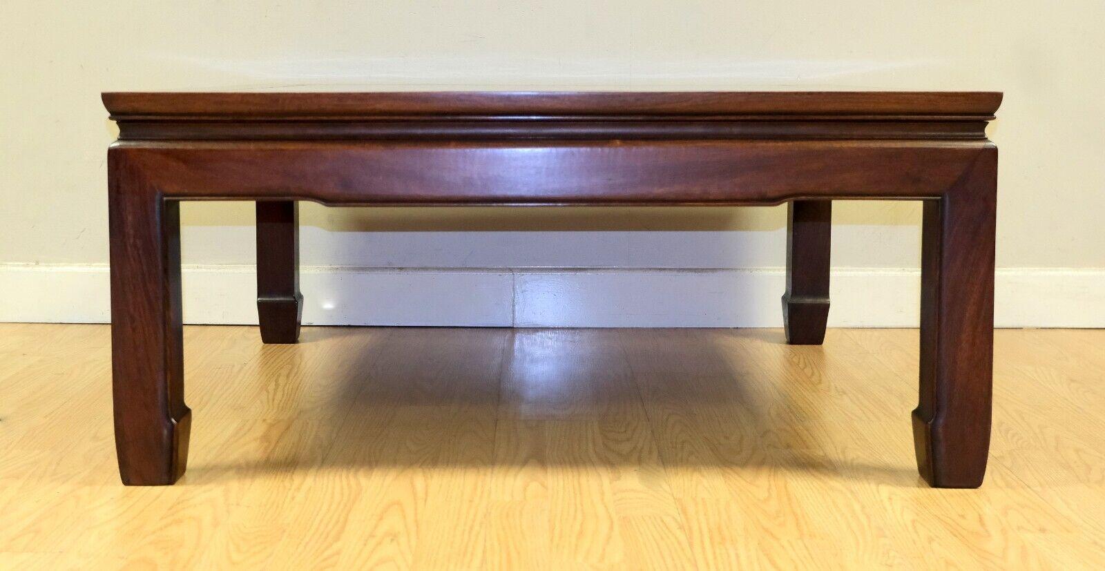 We are delighted to offer for sale this charming Rosewood Ming style Chinese coffee table. 

This well made table features hoof feet and a natural colour that make it easy to combine in any room.  This table is simple yet stunning from any point of