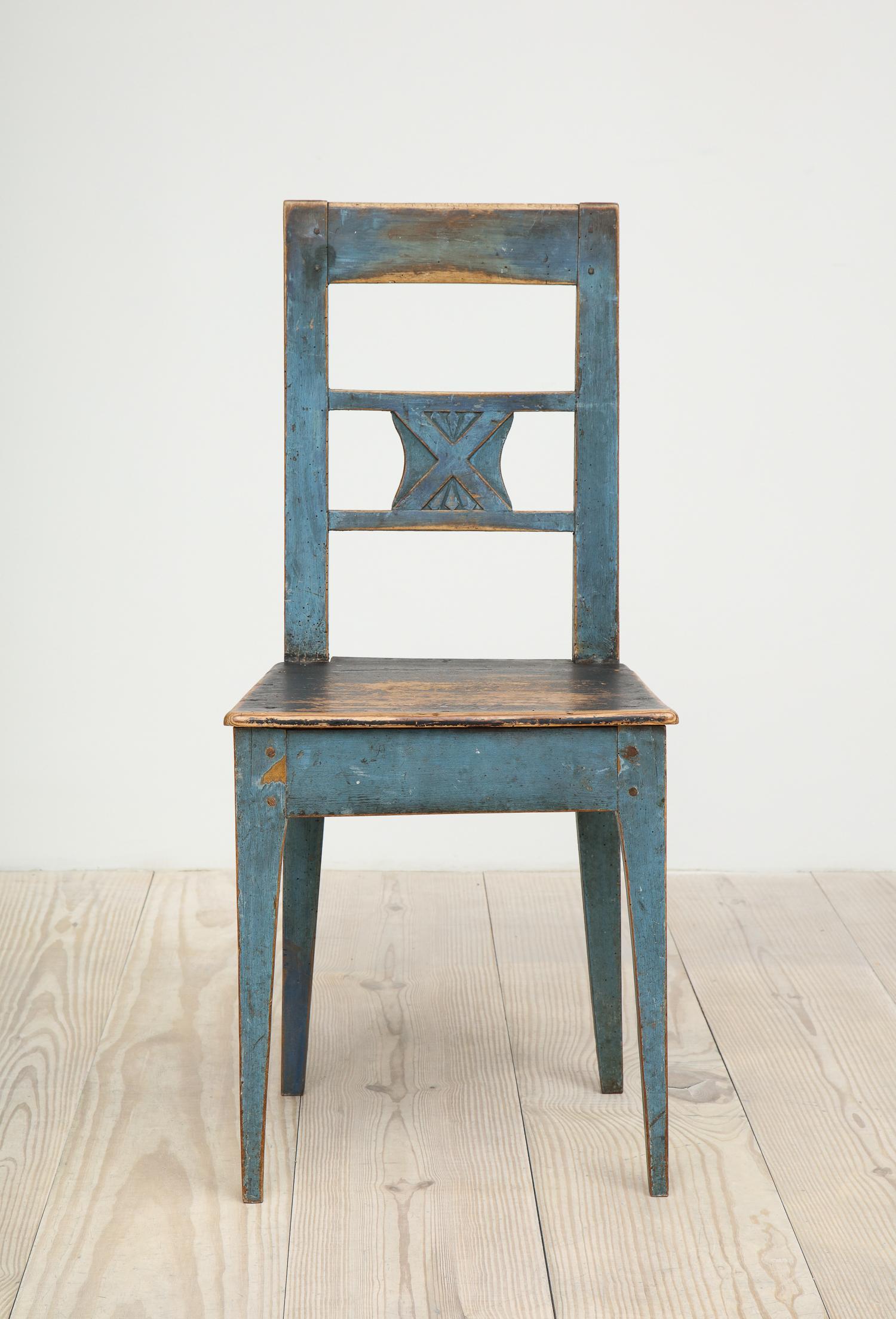 Swedish Allmoge chair, origin: Sweden, circa 1800, charming hand-carvings with original blue and black paint

Allmoge is the Swedish word referring to furniture and objects belonging to and made by country or rural folk. Today such pieces are