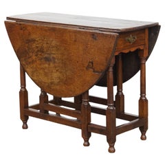 Charme Antiques, antico tavolo inglese in legno di quercia Foldes del XVIII secolo