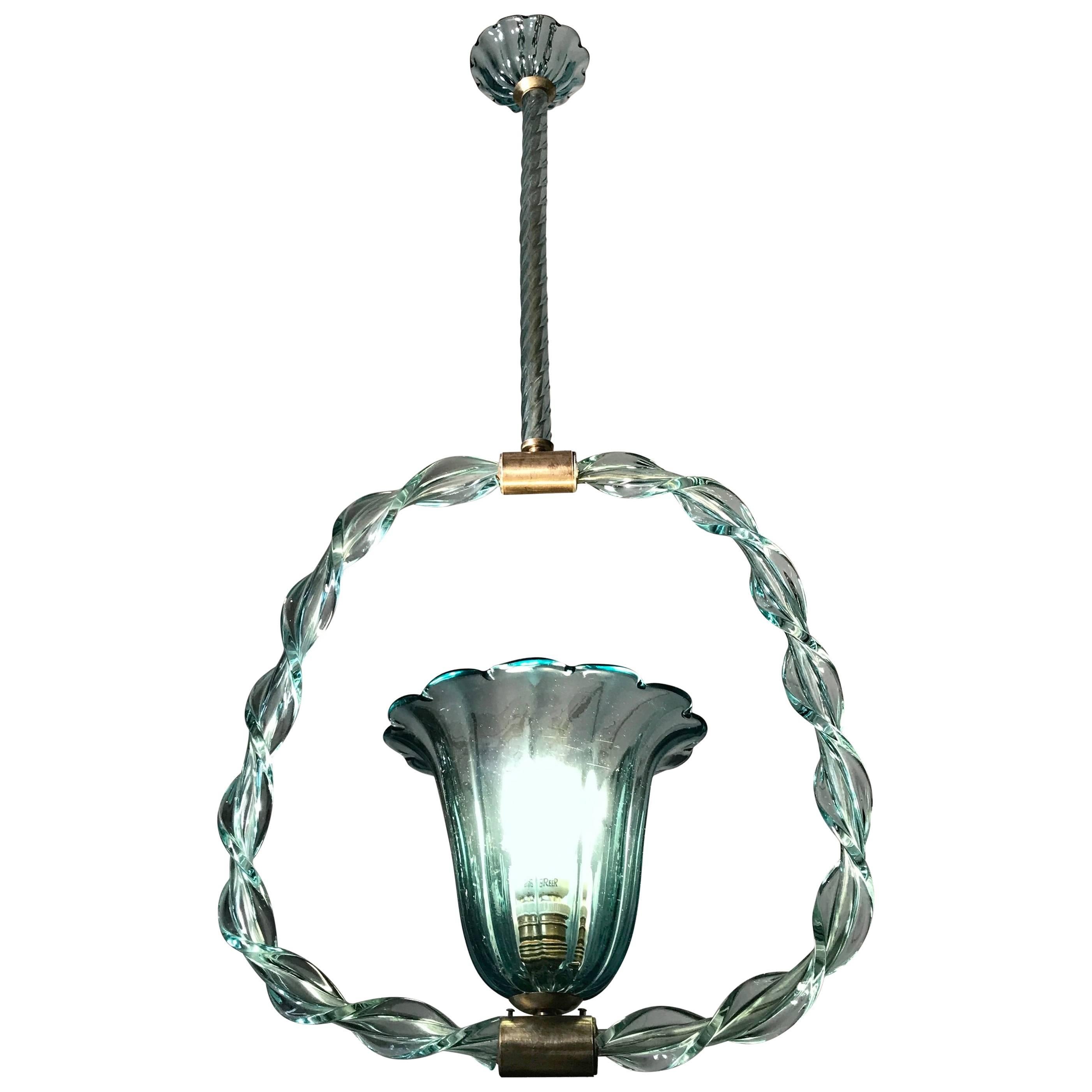 Rare beauty 'Aquamarine' colored glass chandelier by Ercole Barovier, 1940s. 
Brass with original patina.
 Single light socket E27. We can wire for US standards.