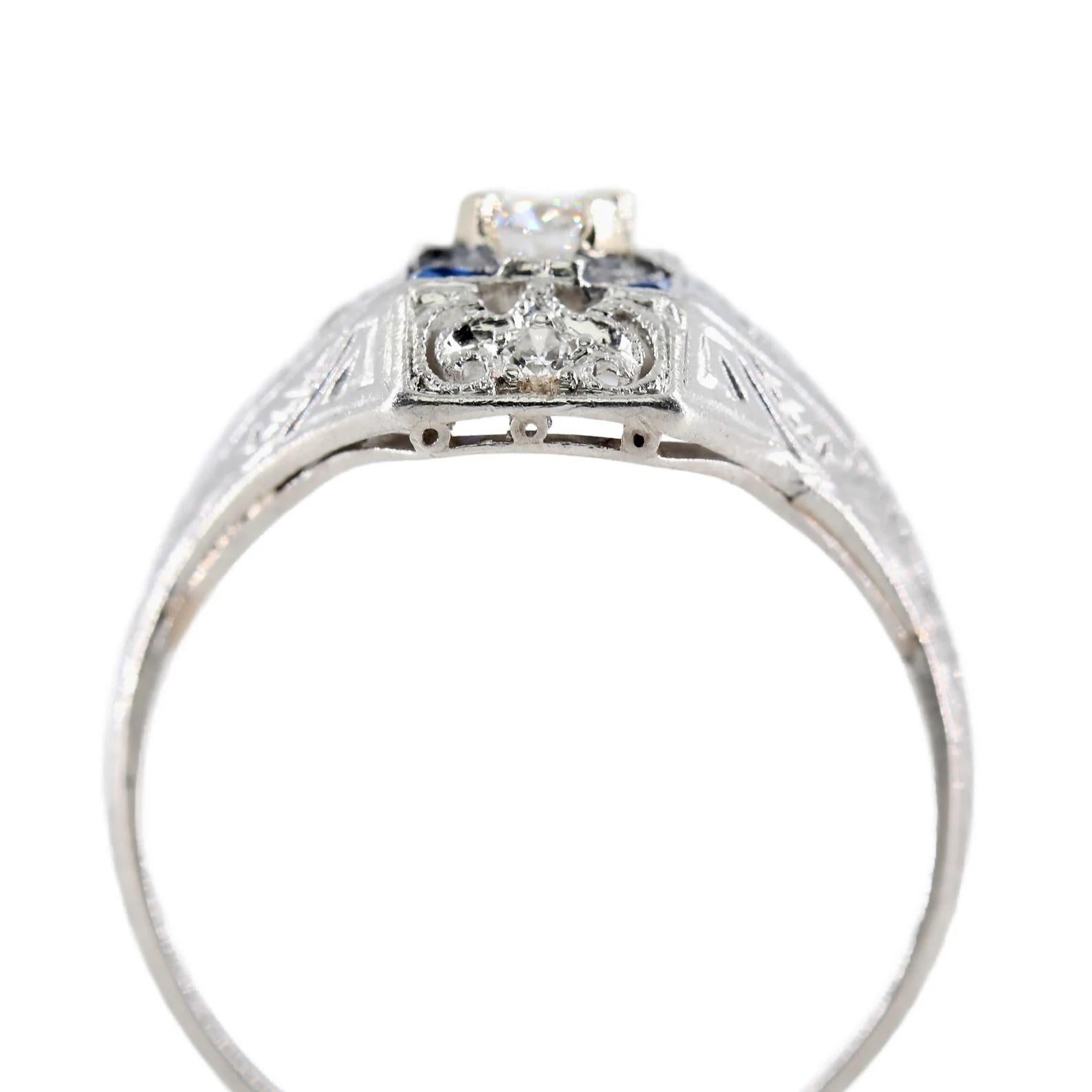Women's Charming Art Deco Diamond, & Sapphire Engagement Ring in Platinum Circa 1920's For Sale