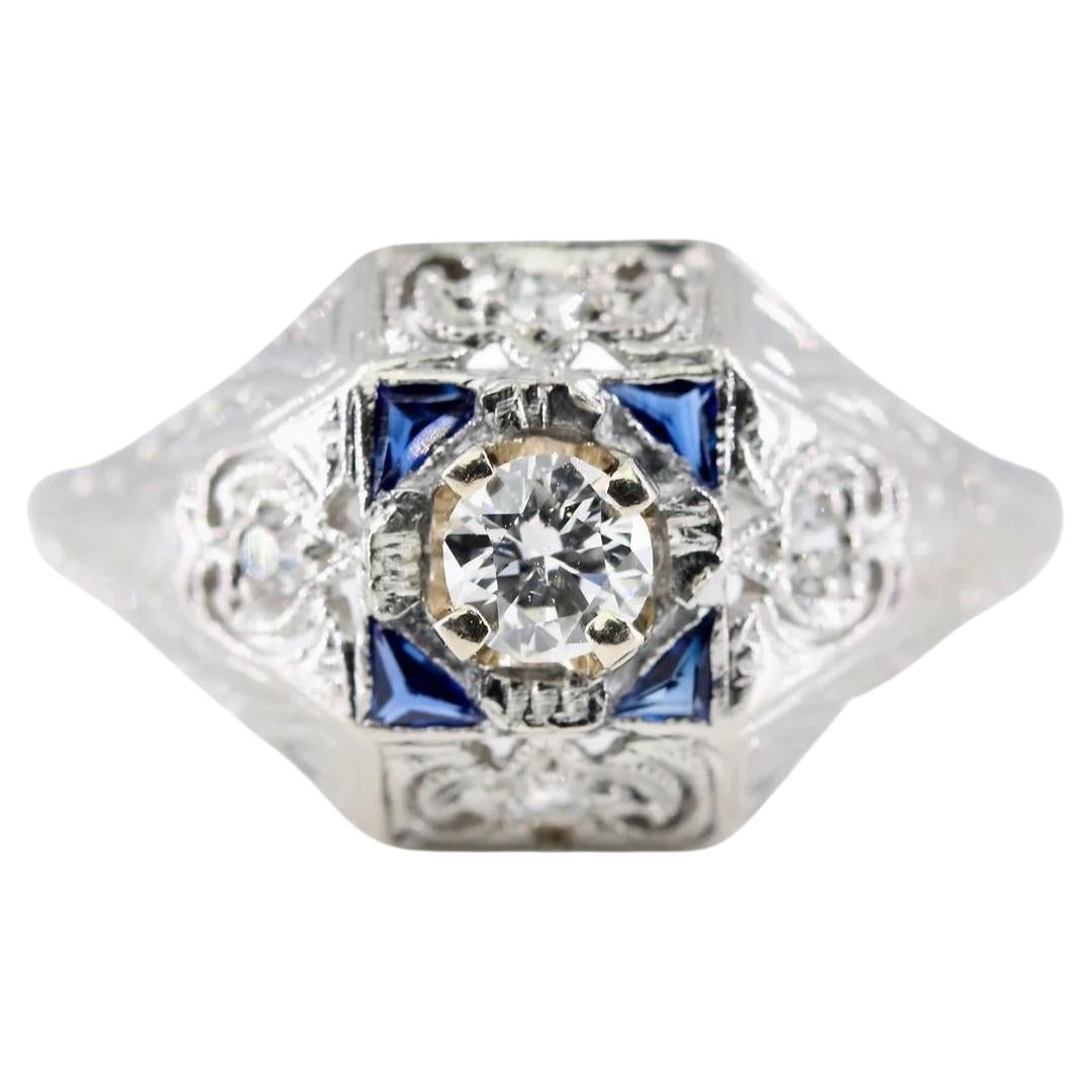 Charming Art Deco Diamond, & Sapphire Engagement Ring in Platinum Circa 1920's For Sale