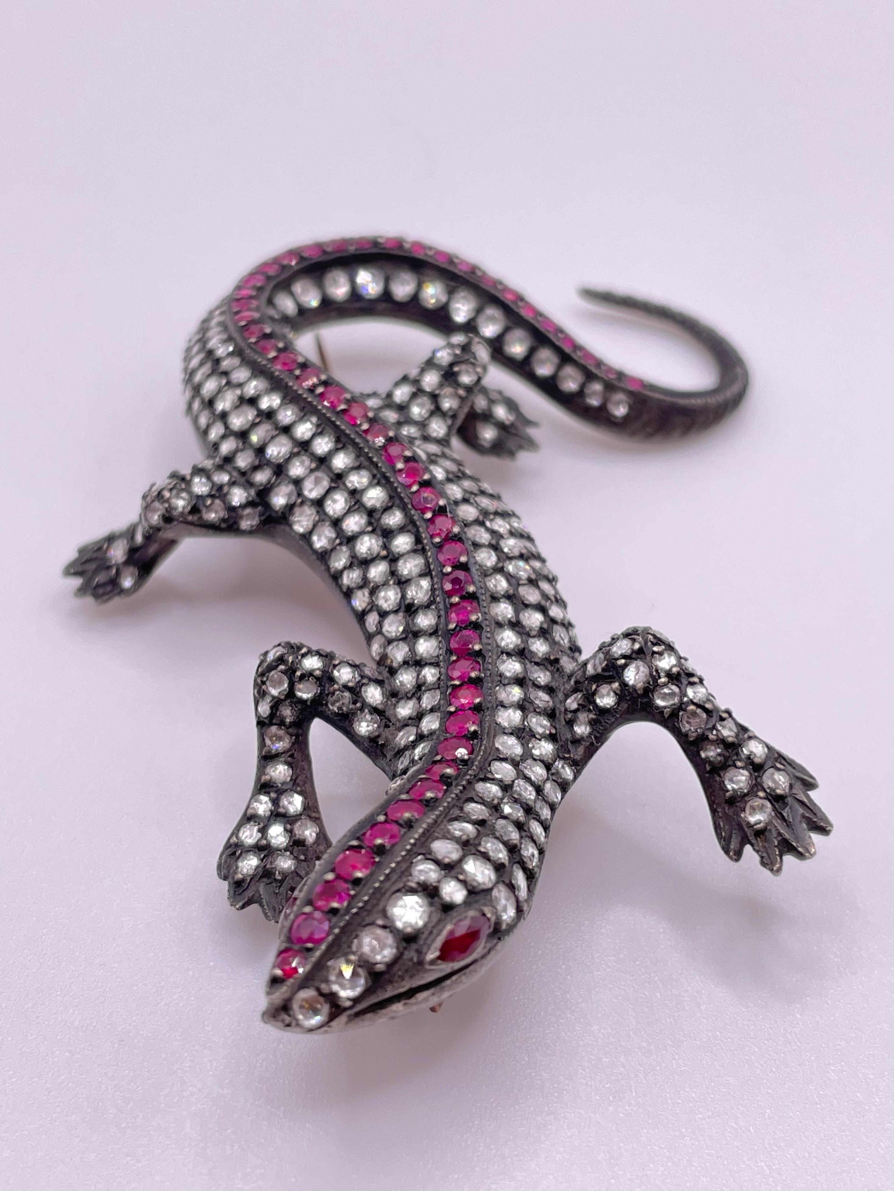 Charming early Art Deco Lizard Brooch with Rose-Cut Diamonds and Ruby , set in 14k gold and Silver . 
This lovely piece has approximately 6 carats  Rose-cut Diamonds ( 300 pieces ) , and 1.7 carats Rubies ( 50 pieces )