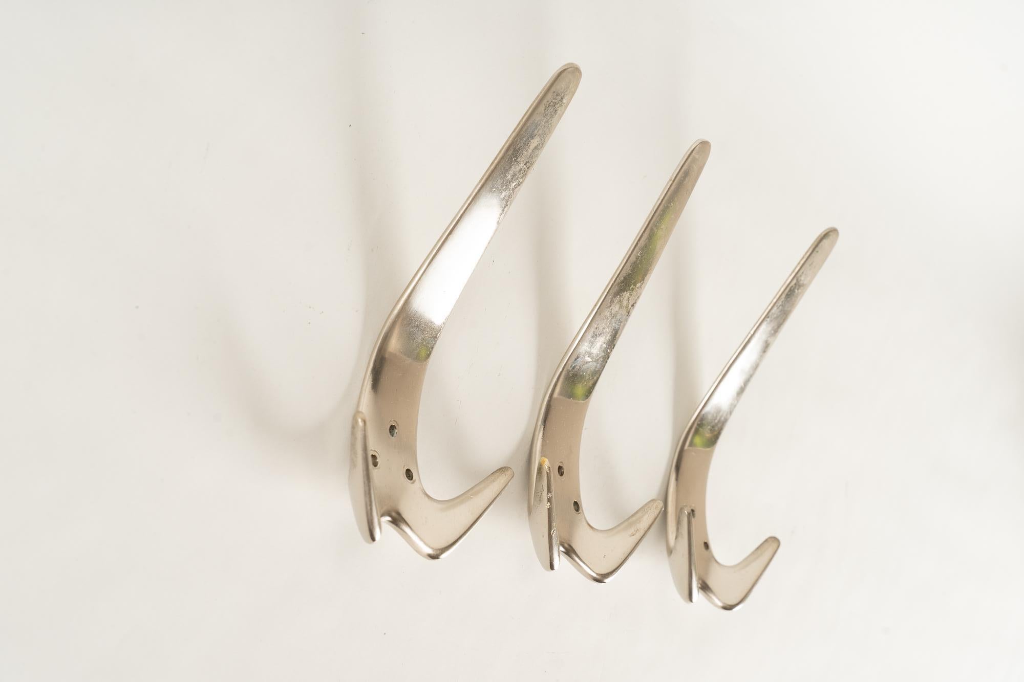 Plated Charming Auböck Wall Hooks, circa 1950s For Sale