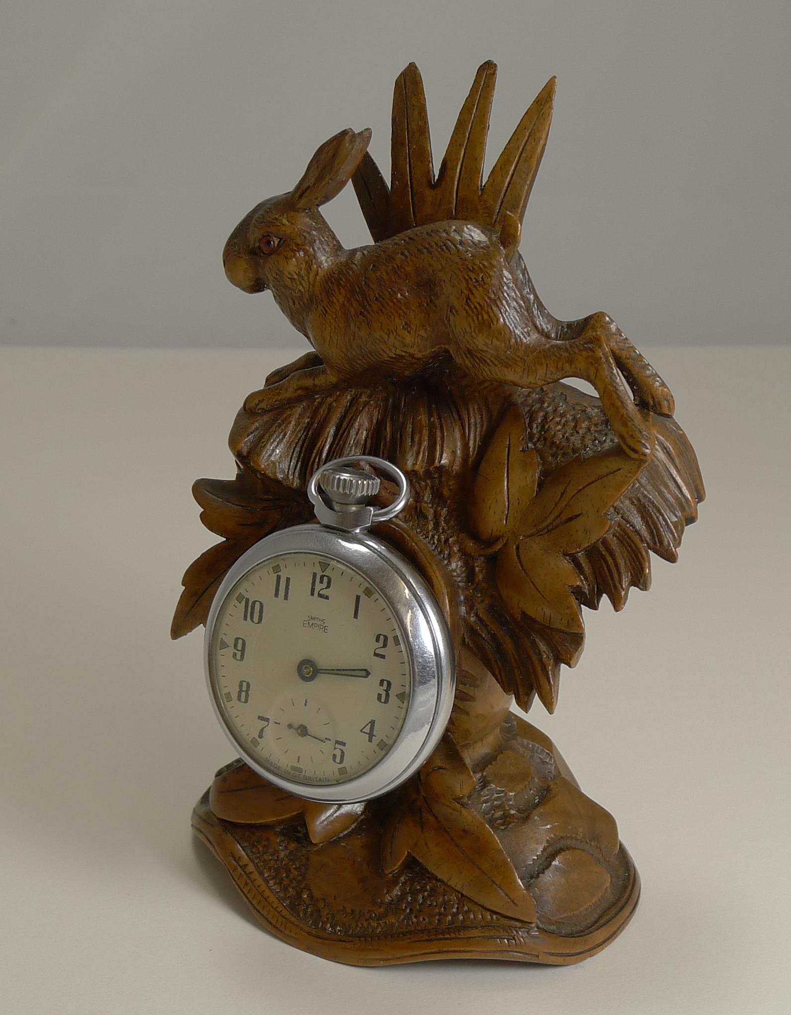 A wonderful figural pocket watch stand (pocket watch not included) from Black Forest region, hand-carved circa 1890-1900 from Linden wood.

Of course what makes this highly collectible is the carved Hare to the top, retaining it's two original