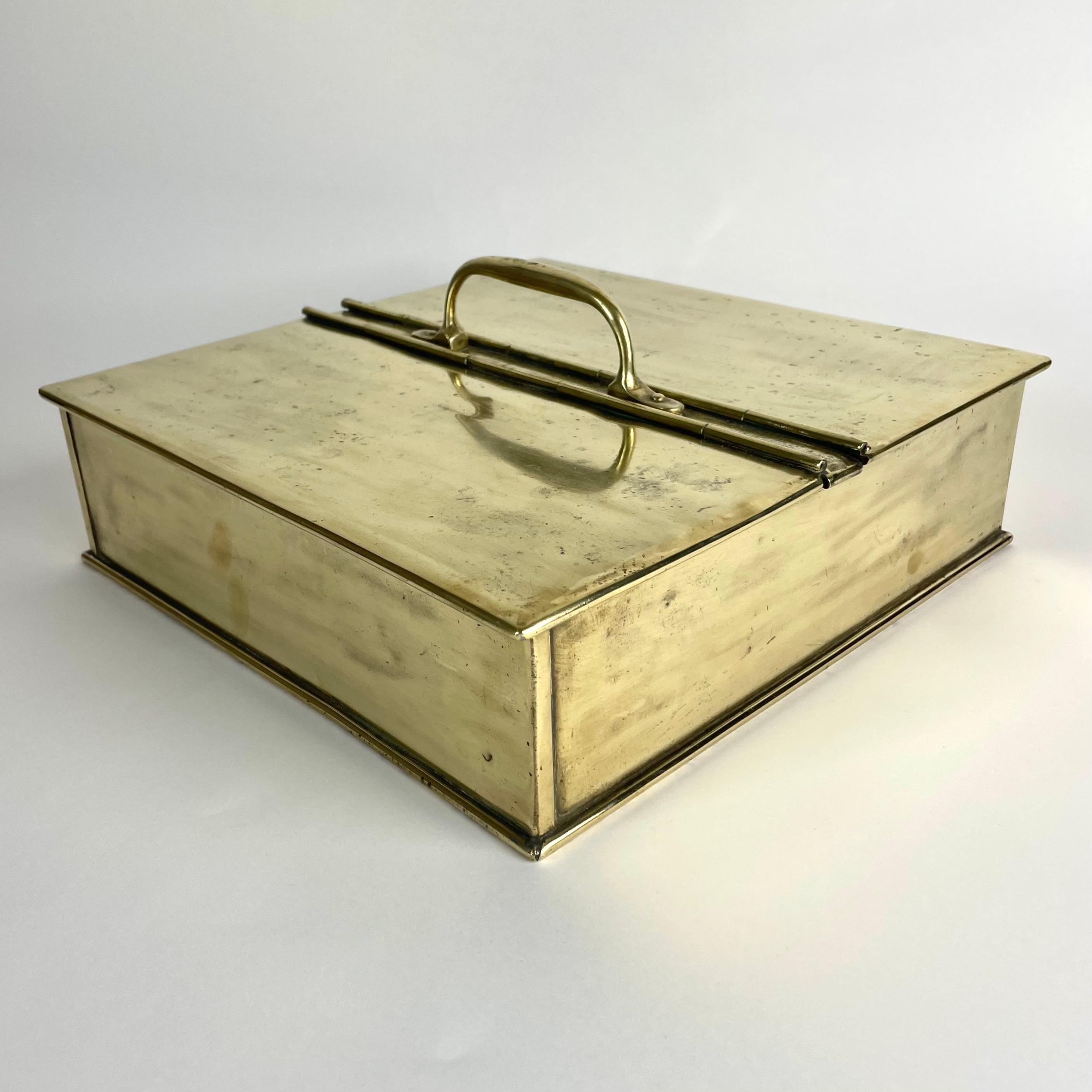 

Charming Brass Spice Box by Jones Bros, England, Early 1900s

A beautifully patinated and functional brass spice box with interior compartments in zinc, made in England in the early 20th century. Marked by the maker Jones Bros, this piece