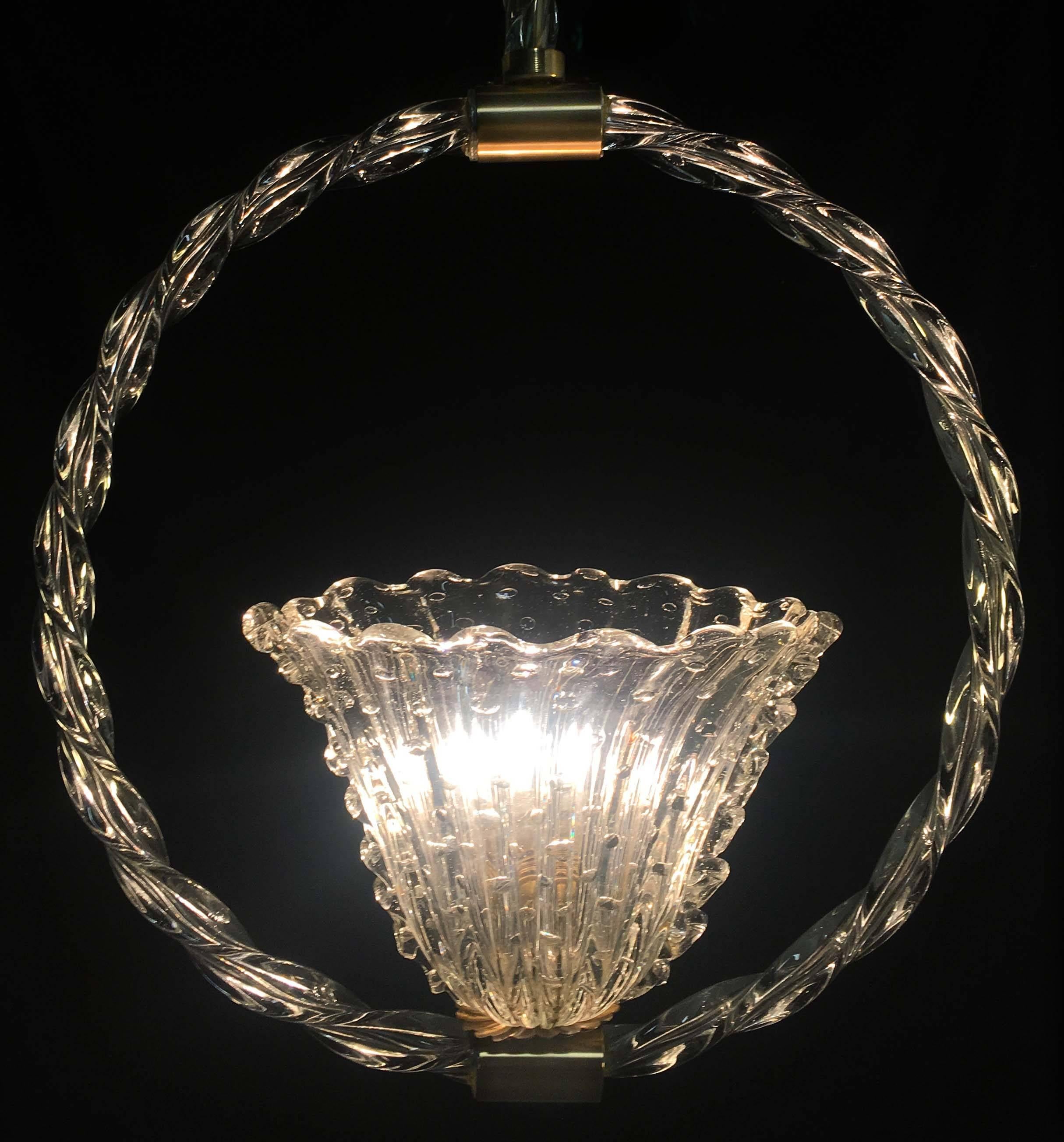 Chandelier with sober and elegant shapes. An authentic jewel out of the Murano furnaces.
    