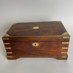 Charming Campaign Box in Camphor with hidden drawers from the 19th Century