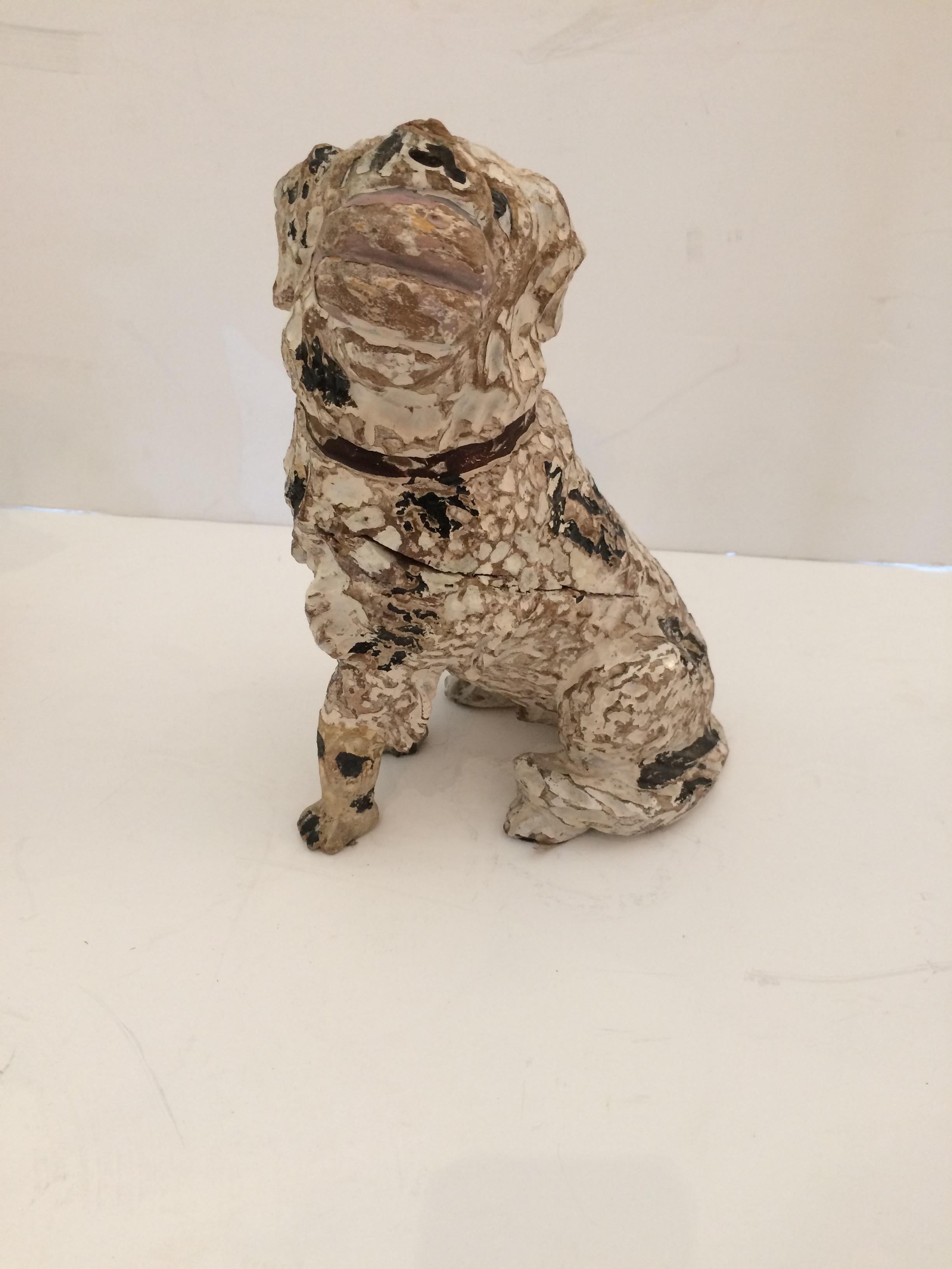 An adorable vintage carved wood dog originally from a French bakery display, roughly hewn and wonderfully rustic with a cute expression and ball in its mouth.