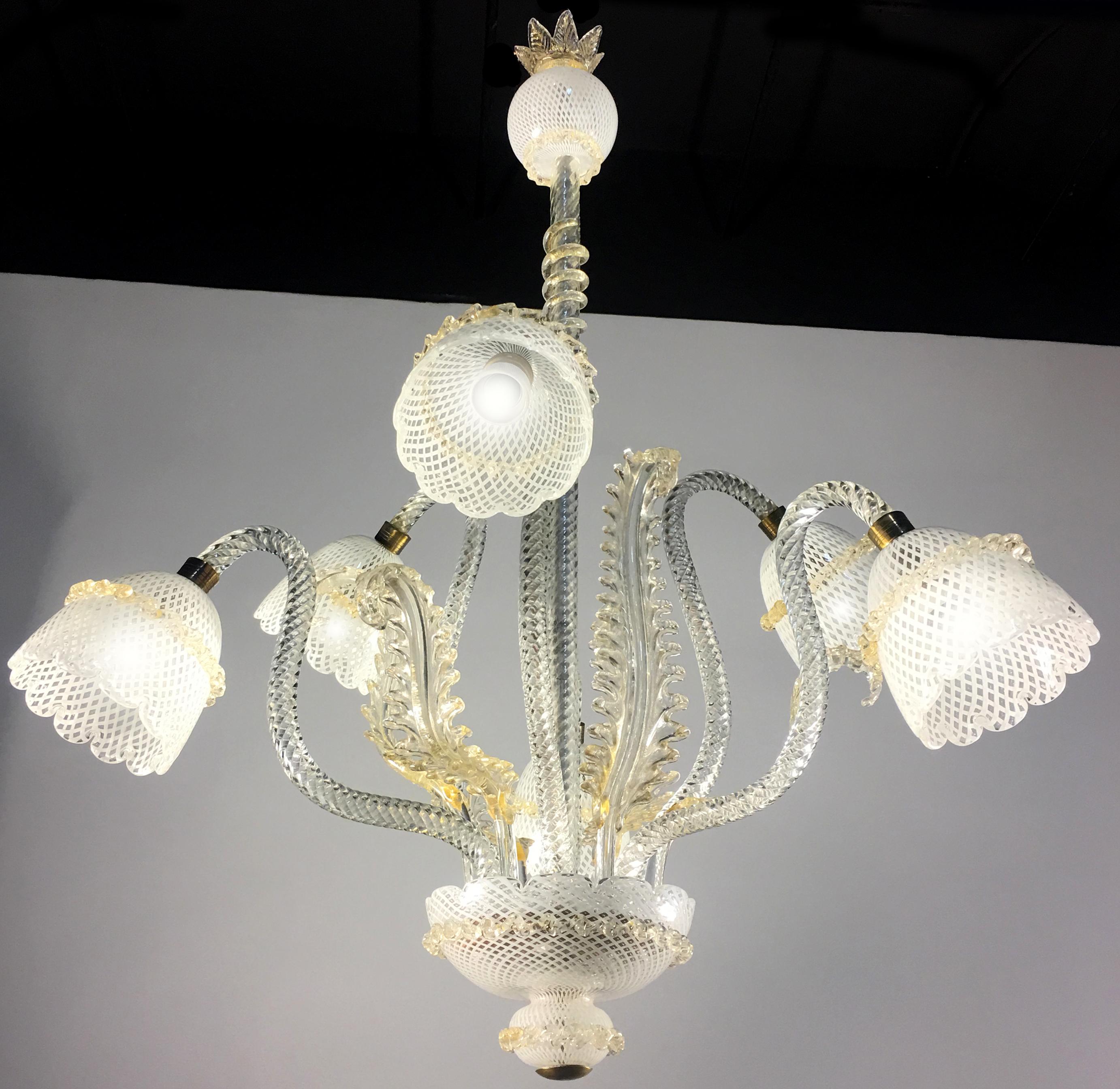 Six-arm chandelier gold inclusions, Italy. Hand blown glass using the ‘Reticello’ technique.