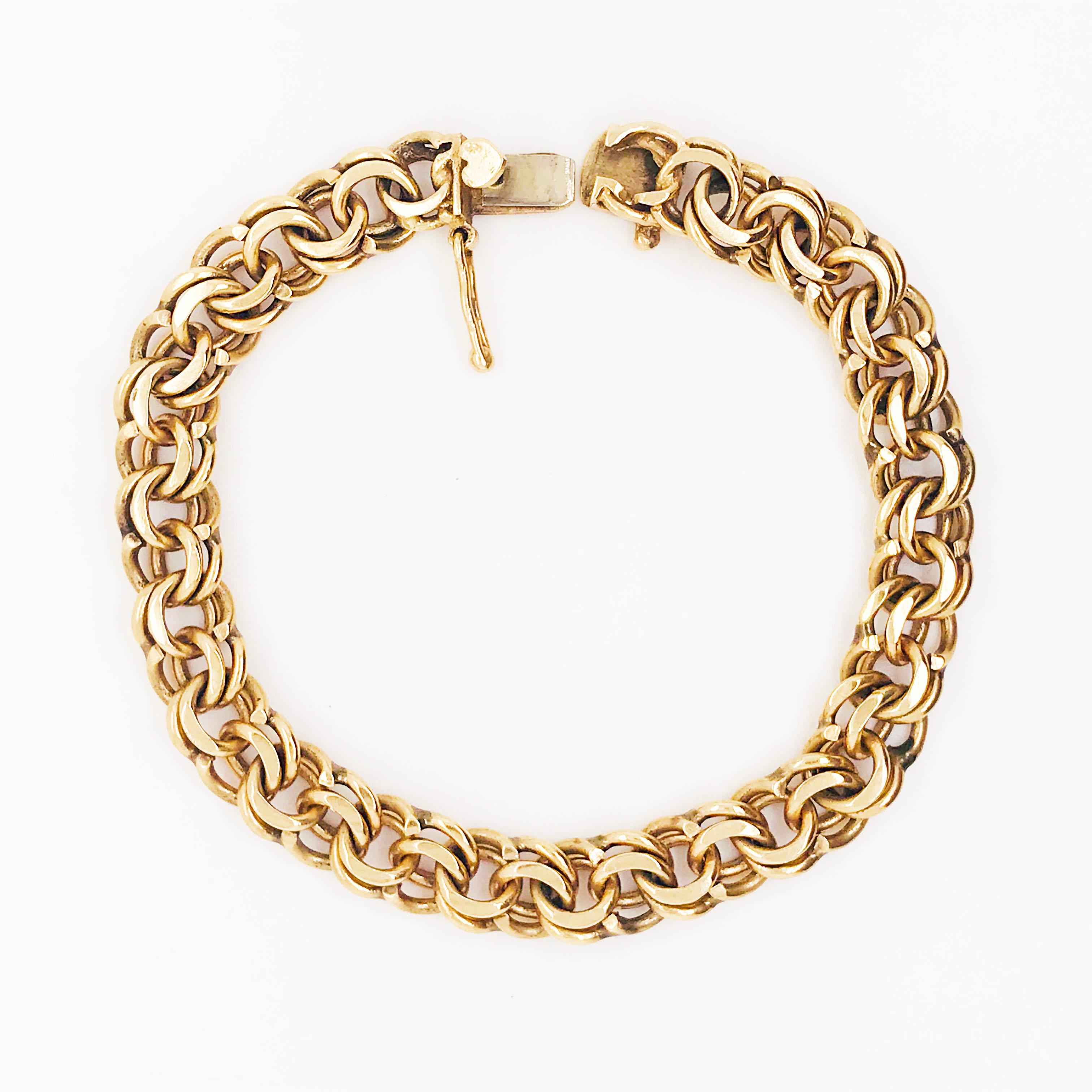 This 14 karat yellow gold charm bracelet is so RETRO!  Originating from Rhode Island, this charm bracelet was designs so that you can wear the extra large charms on it! These are the charms that are large enough to wear as pendants!  Today, a woman