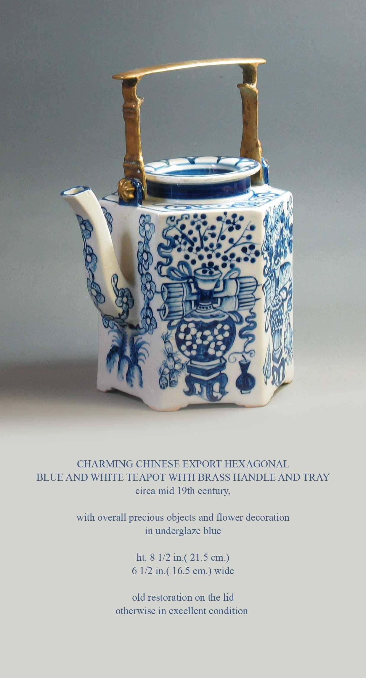 Charming Chinese Export hexagonal blue and white teapot with brass handle and tray, circa mid-19th century, overall precious objects and flower decoration in unglaze blue. Measures: Height is 8 1/2