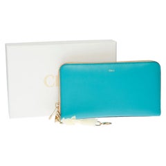 Charming Chloé bicolor wallet in turquoise and black leather with gold hardware