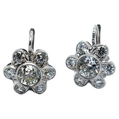 Charmantes boucles d'oreilles Daisies en or blanc 14 carats et diamants