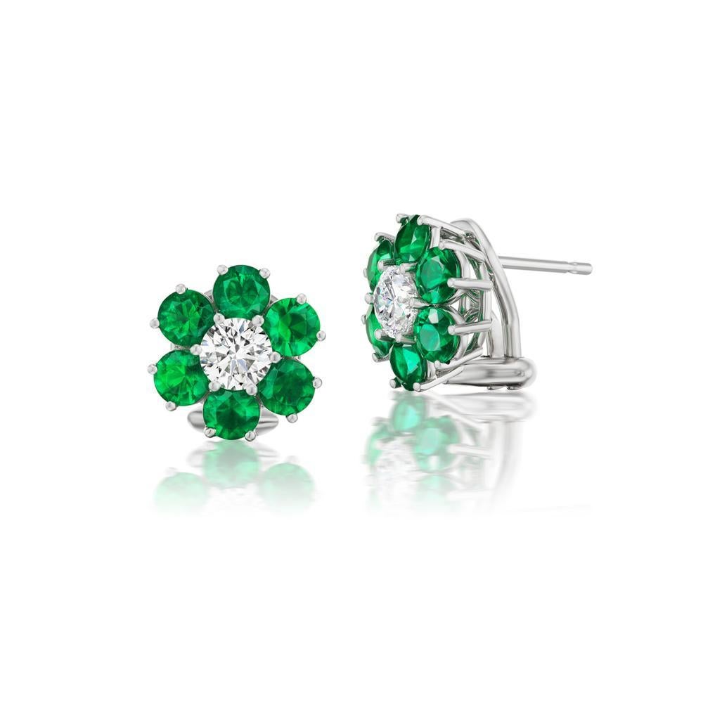 Platinum 2.45ct Emerald And 1.0ct Diamond Earrings

Radiant green hued Emeralds surround these precious certified
diamonds to form a pleasant floral pattern in this pair of emerald
earrings
Item: # 04105
Metal: Platinum
Lab: Gia
Color Weight: 2.45