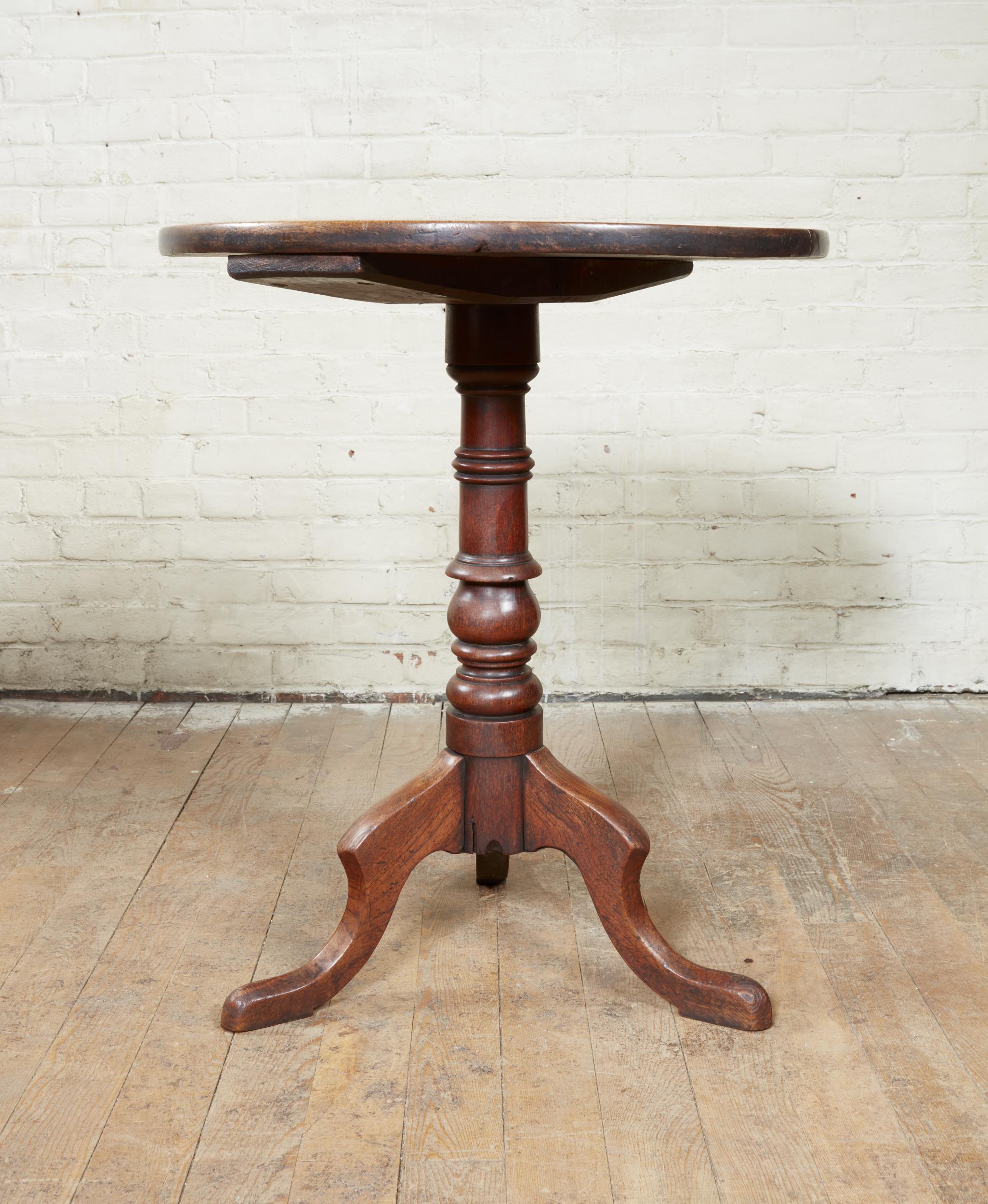 Good early 19th century English vernacular candlestand or wine table, the two plank top made from Thorn Acacia, a seldom seen timber in English (or any!) furniture, having simple rounded edge over turned shaft and standing on well shaped slipper
