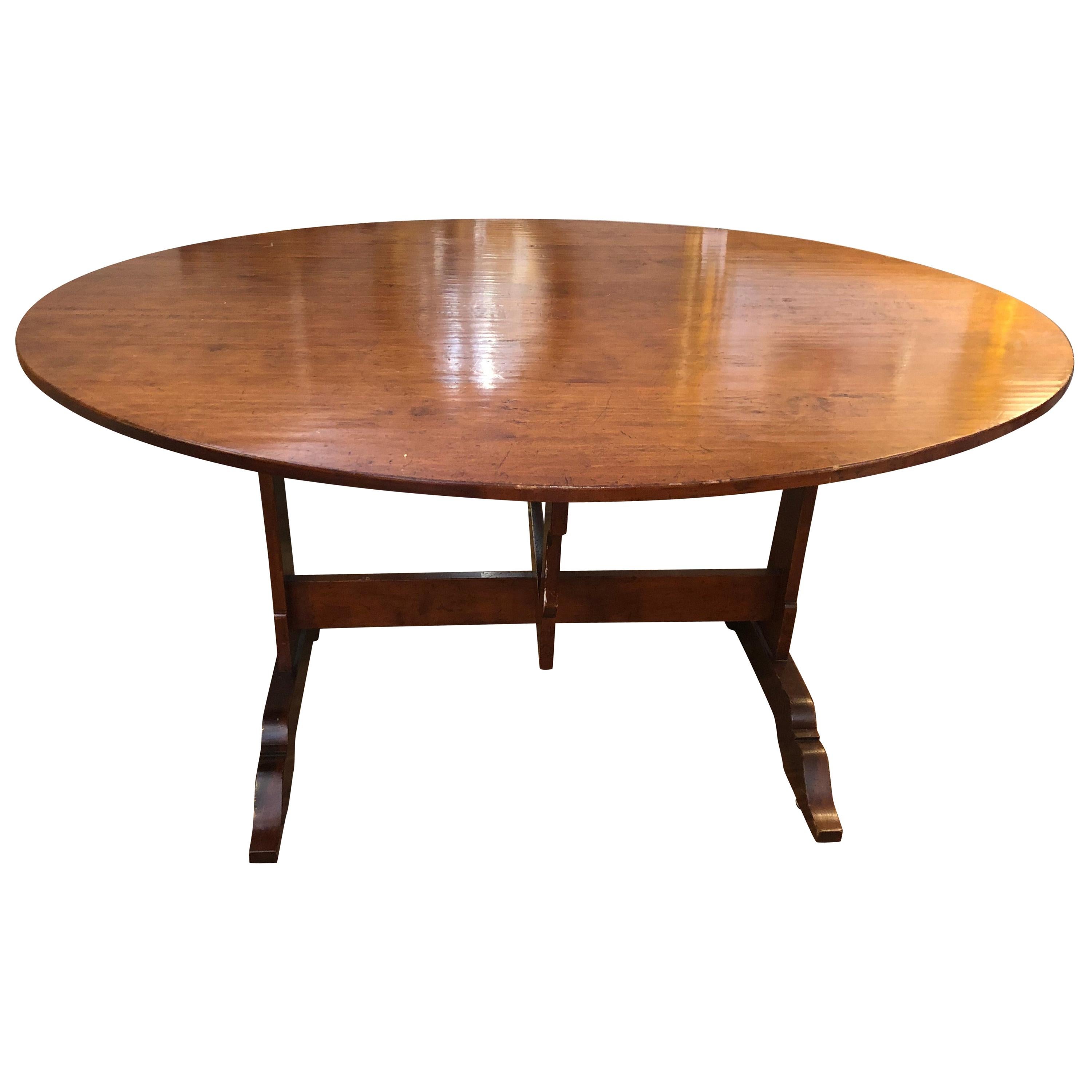 Charming Federal Style Cherry Trestle Base Oval Gate Leg Dining Table