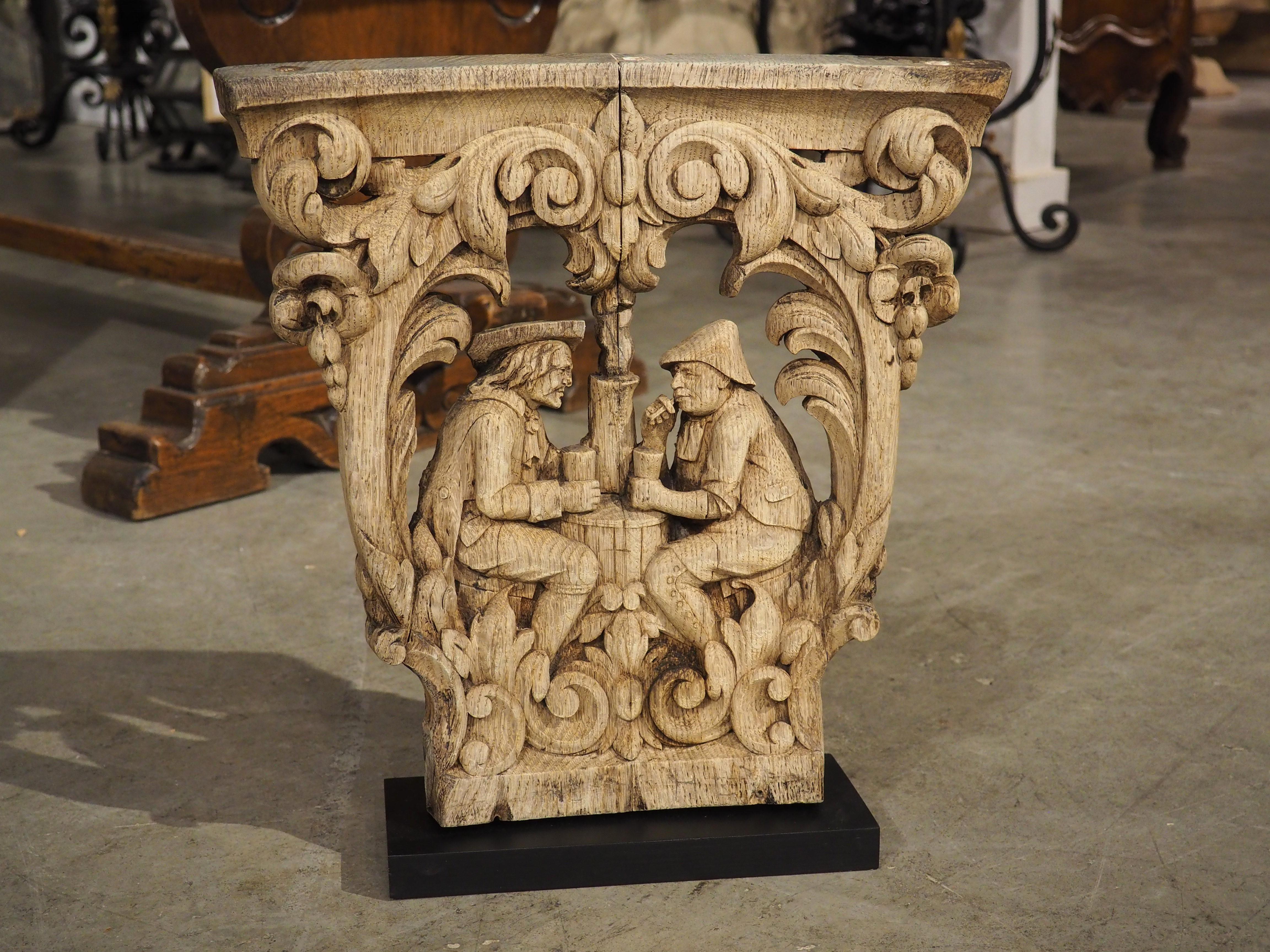Belgian Charming Flemish Washed Oak Capital, Two Men Drinking at a Barrel, Circa 1800 For Sale