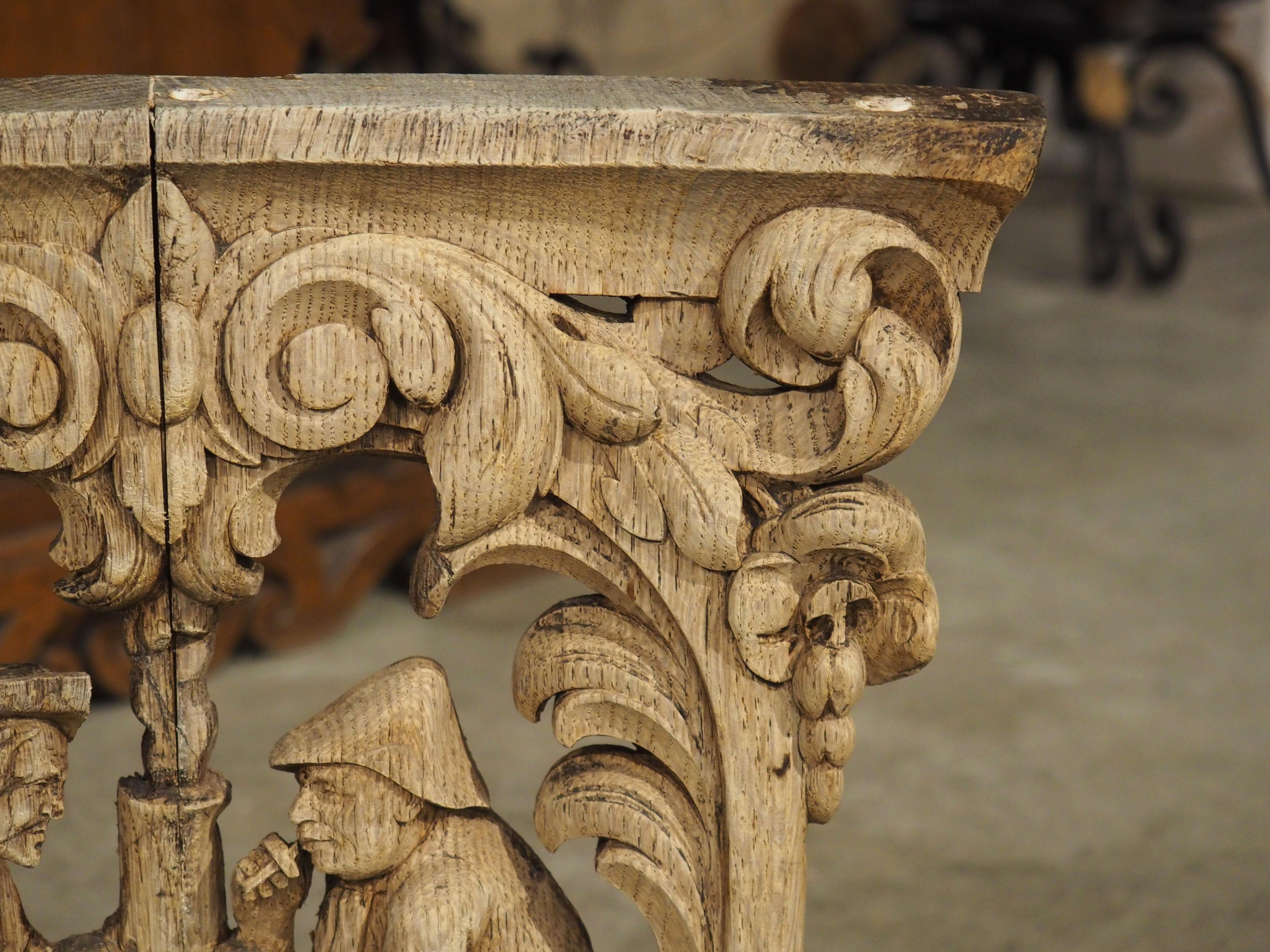 Charming Flemish Washed Oak Capital, Two Men Drinking at a Barrel, Circa 1800 In Good Condition For Sale In Dallas, TX
