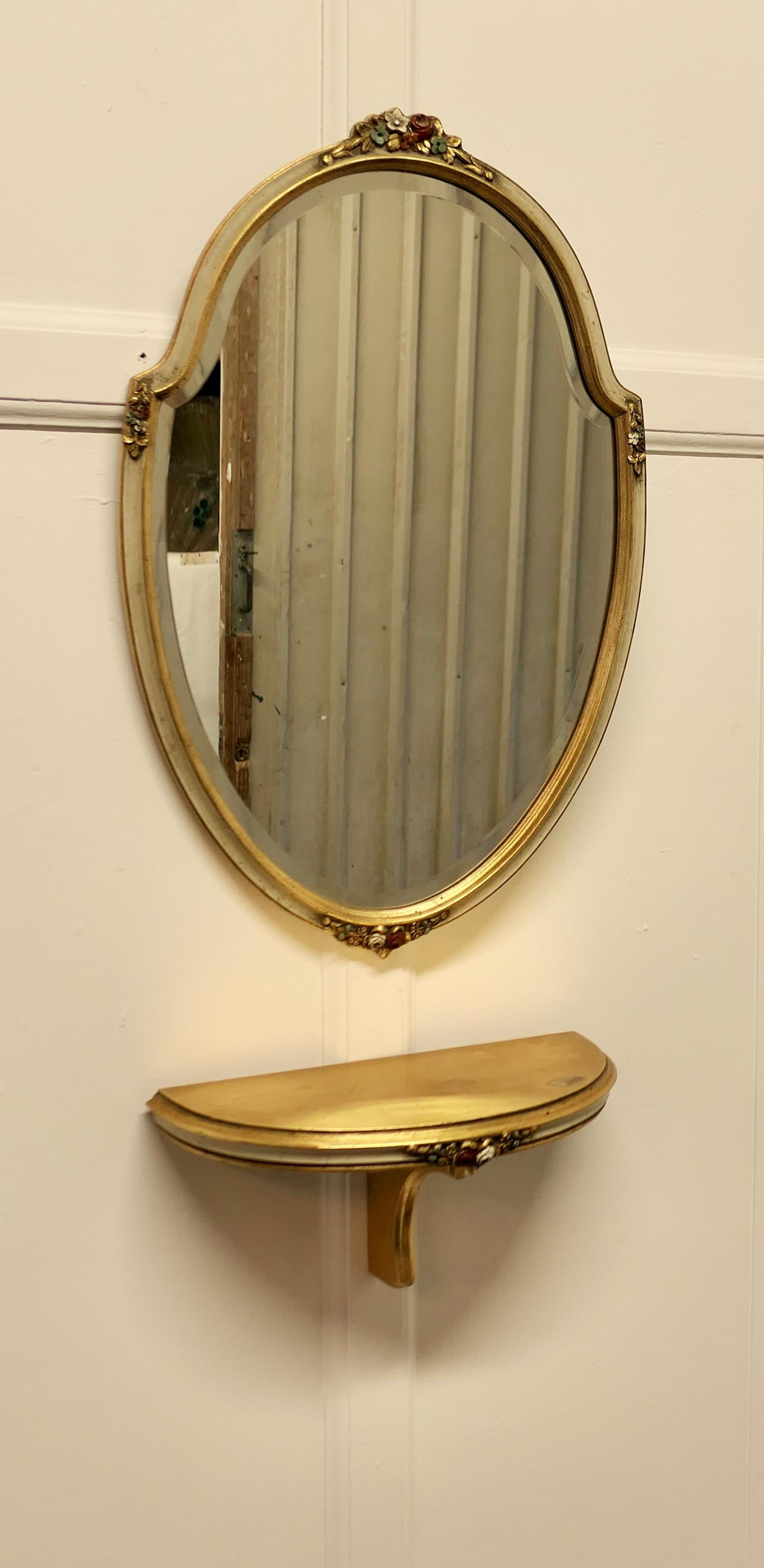 Charming, French Barbola gilt console shelf and mirror.

A beautifully decorated little gilt shelf with matching mirror, 
This delightful pair have barbola decoration on gilt and light cream.
They are both in good attractive condition with very