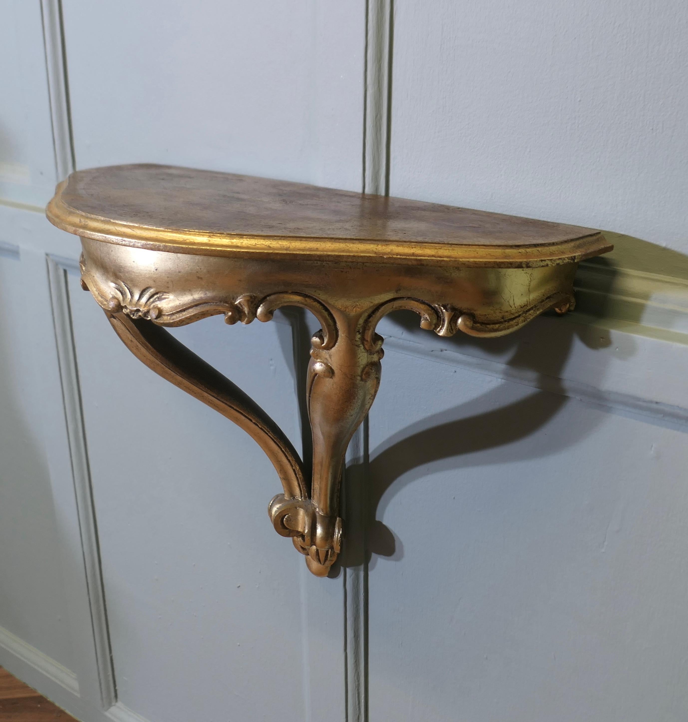 20th Century Charming French Gilt Console Hall Table, Wall Shelf  A beautiful gilt console ta For Sale