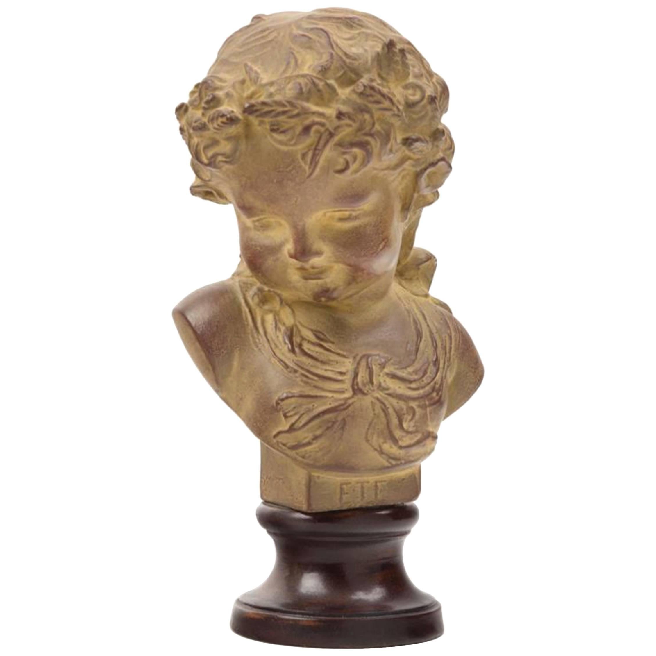 Charming French Terracotta Bust on Ebonized Wood Base Depicting Young Child. For Sale