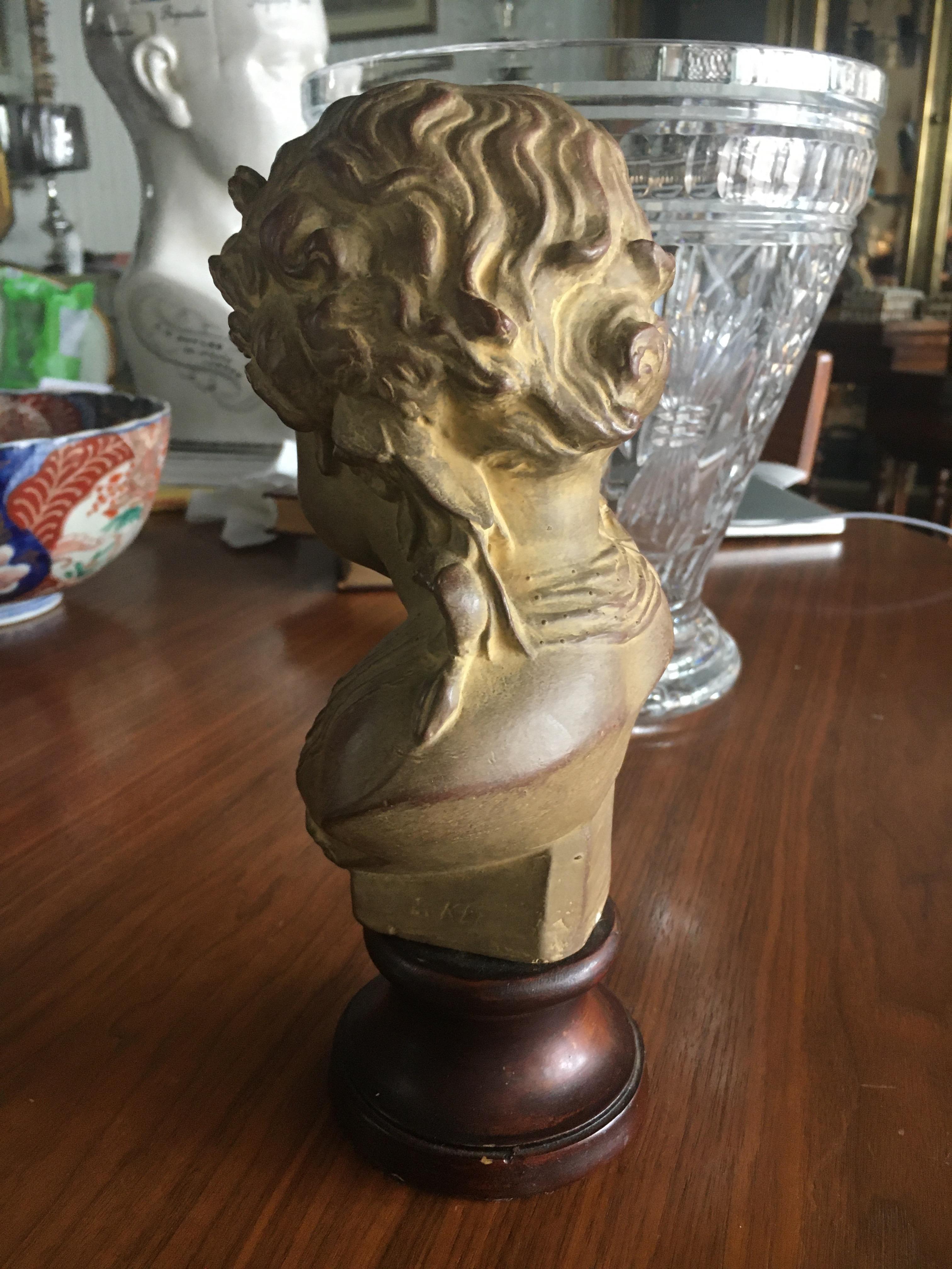 19th Century Charming French Terracotta Bust on Ebonized Wood Base Depicting Young Child. For Sale