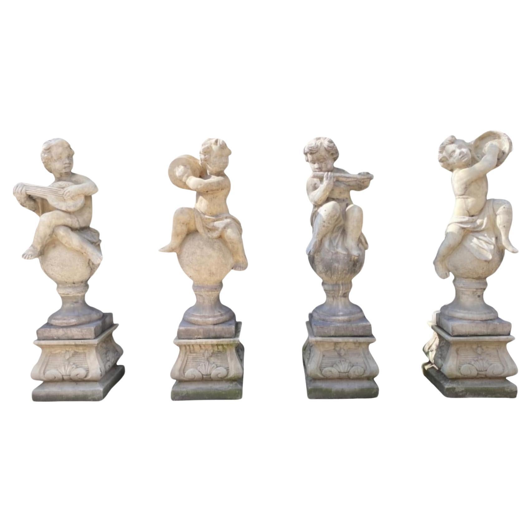 Charmantes sculptures en pierre pour le jardin - Lot de 4 chérubins en vente