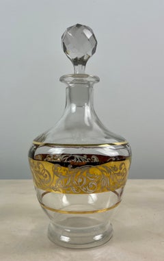 Art deco decanter in gilded glass and gilded foliage bandage, 1950, France