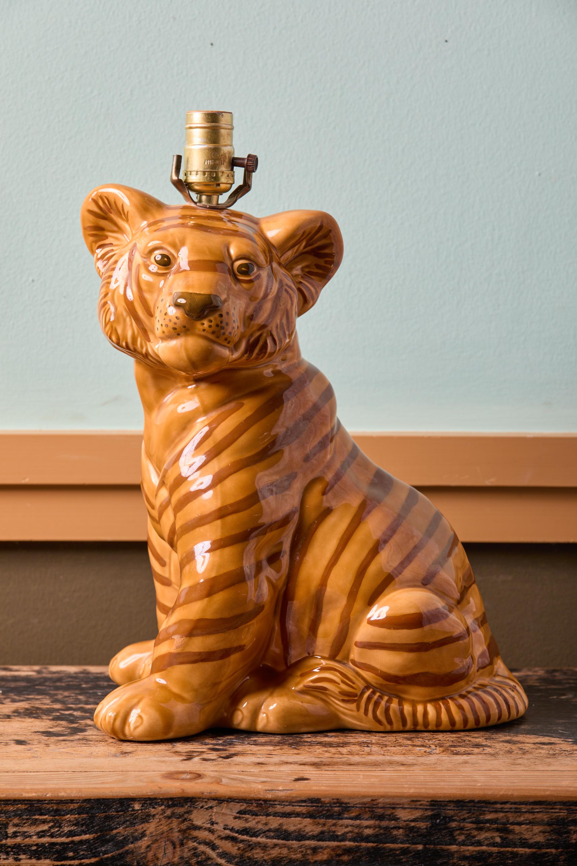 This charming Tiger lamp is a one-of-a-kind piece that would be special in many rooms of a home or office.  Of course, it would be wonderful in a sophisticated child's room or an animal-inspired room.  I might imagine that LSU alumni would enjoy