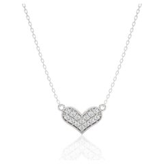 Charmant pendentif cœur : diamants 0,07 carat en or blanc 14 carats