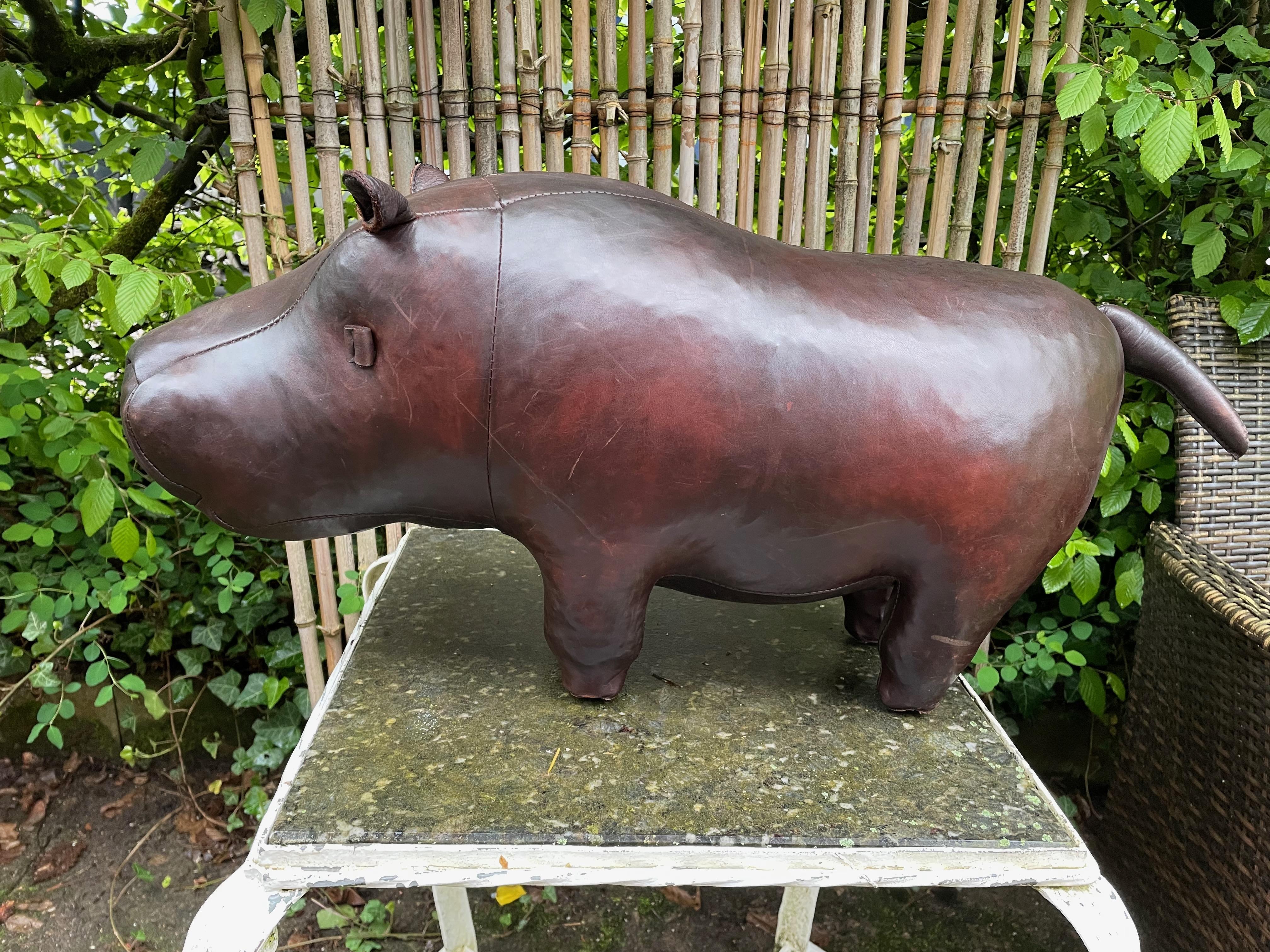 Charming hippopotamus by Dimitri Omersa.
The leather animals by Omersa were originally used as footstools but have since become popular Design Objects for indoor use.
The hippopotamus is in very good general condition , no missing parts, torn, seams