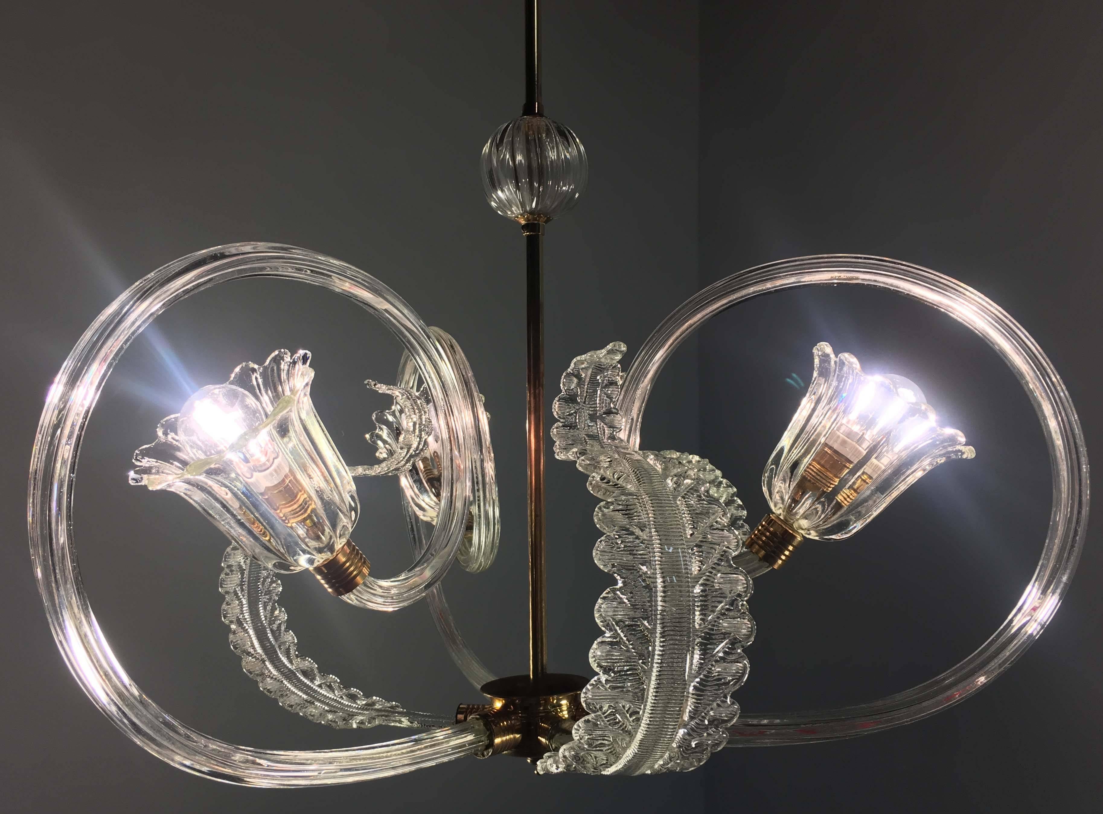 Chandelier with sober and elegant shapes. An authentic jewel out of the Murano furnaces.
 