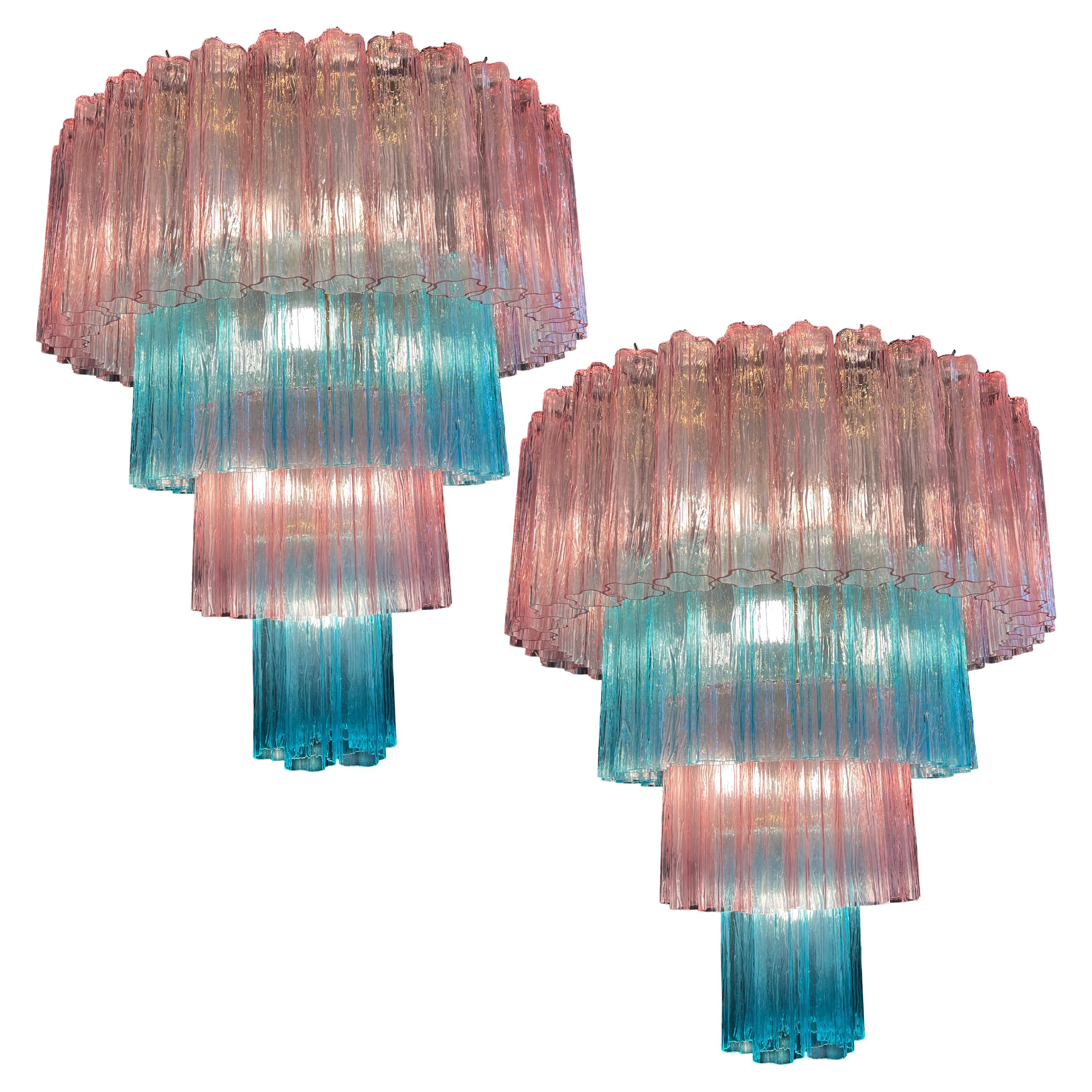 Stunning Murano chandelier. The sophisticated pink and blue color elegantly reflects the light. The height without chain is 112 cm. It can be made to the dimensions requested by the customer.