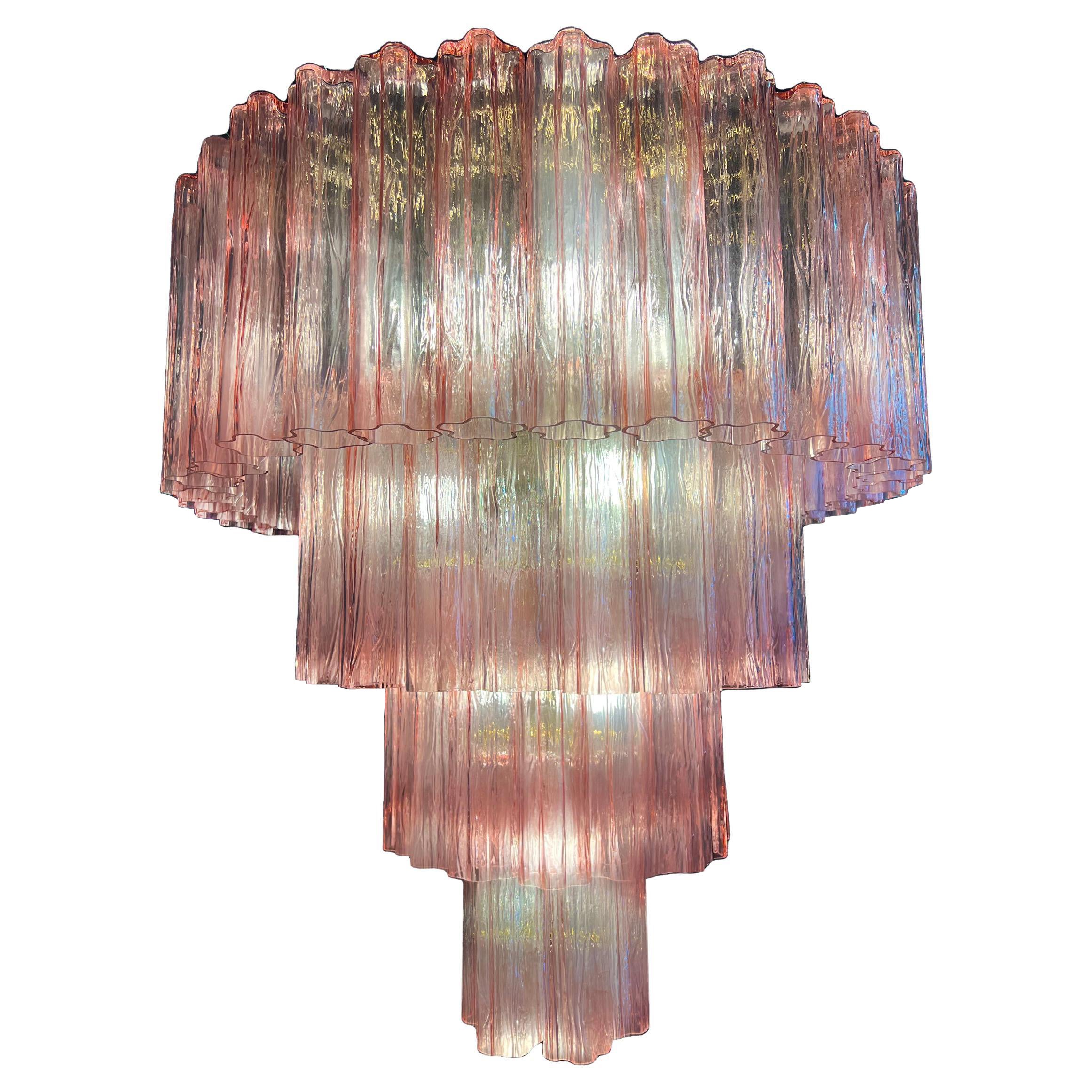 Stunning Murano chandeliers. The sophisticated pink color elegantly reflects the light. The height without chain is 112 cm. It can be made to the dimensions requested by the customer.