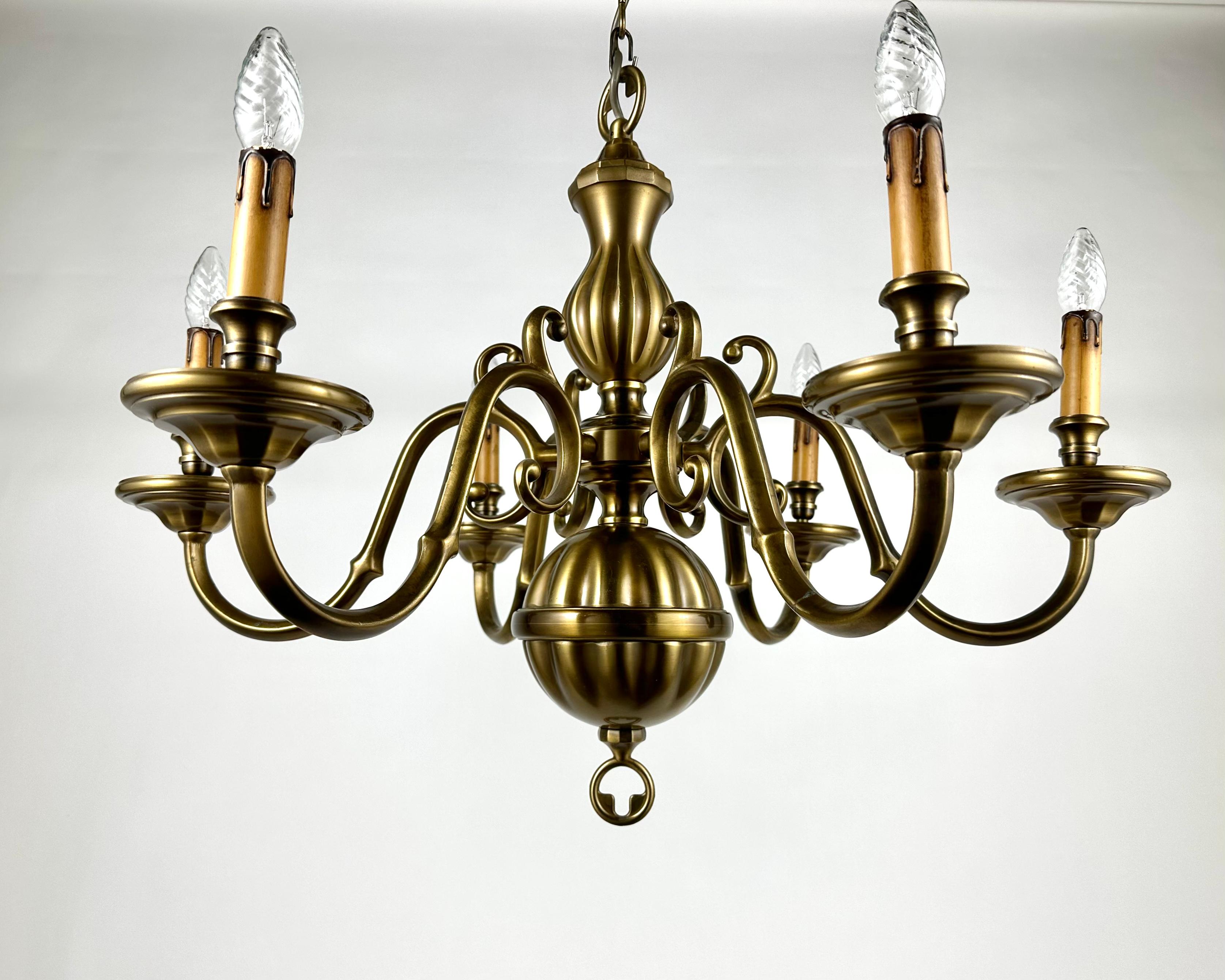 Very Beautiful Vintage Ceiling Chandelier in Bronze by Deknudt, Belgium. 

Circa 1970s.

A very nicely chased vintage six light chandelier in bronze with its original gilded finish.

The forged bronze arms spring off a body and support foliate cups